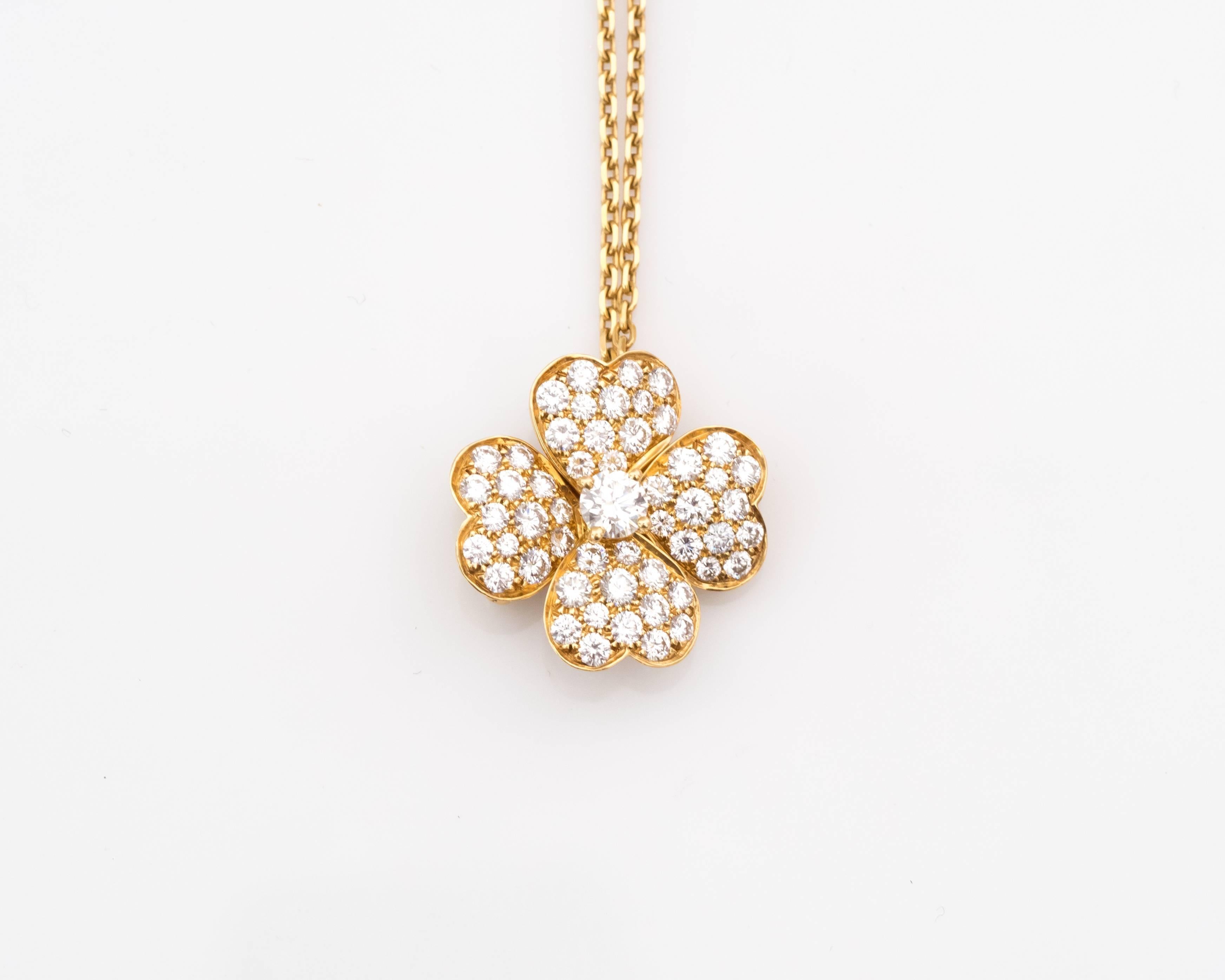 1990s Clover Shaped Diamond Van Cleef Pendant with a 16 Inch Chain
Discontinued Model; Very Rare
Crafted in 18 Karat Yellow Gold

Clover Shaped Pendant features 1.575 carats total of Diamonds
DEF Color
IF-VVS Clarity
52 Round Brilliant Cut Diamonds