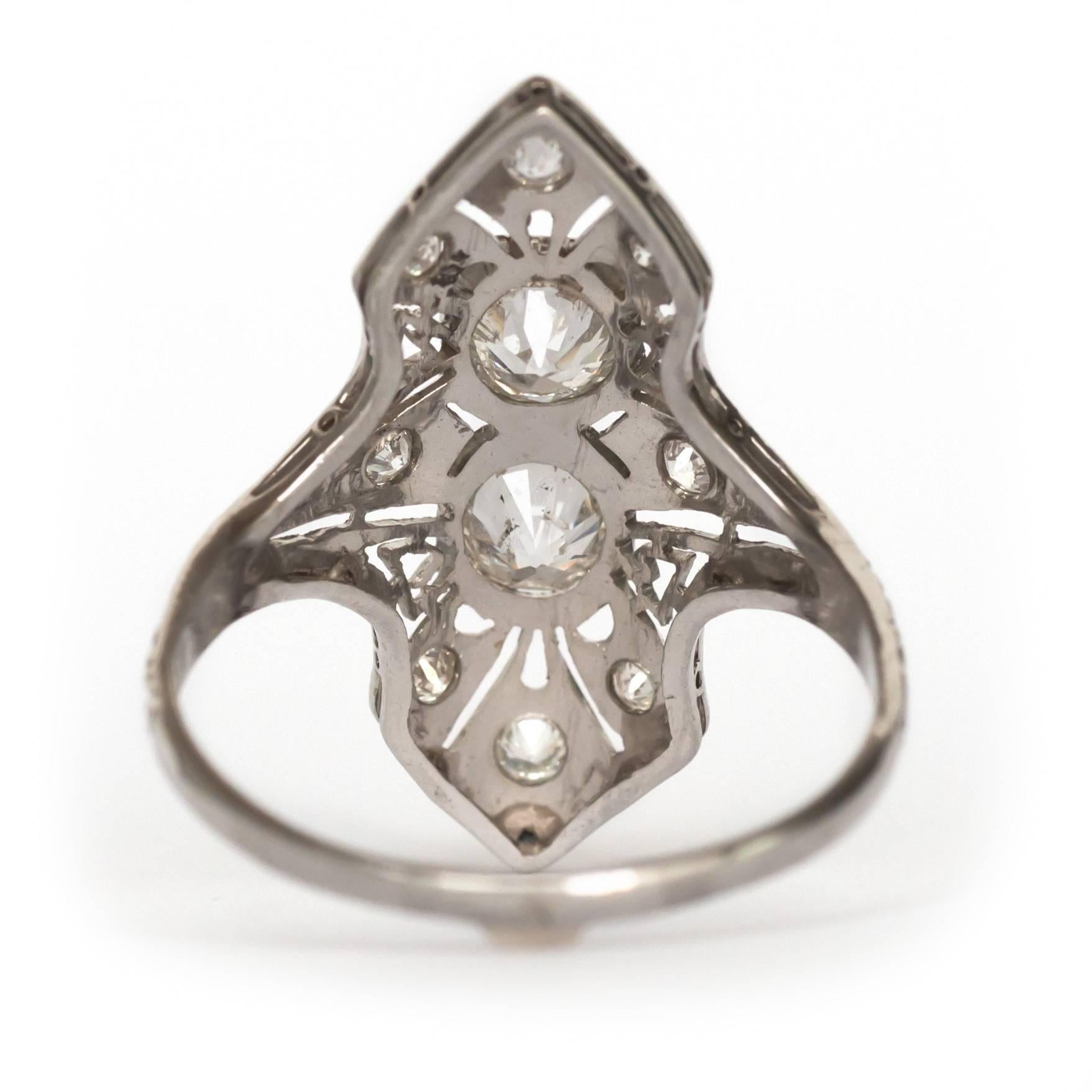 1920s Art Deco Platinum .75 Carat Total Weight Center Diamond Engagement Ring In Excellent Condition In Atlanta, GA