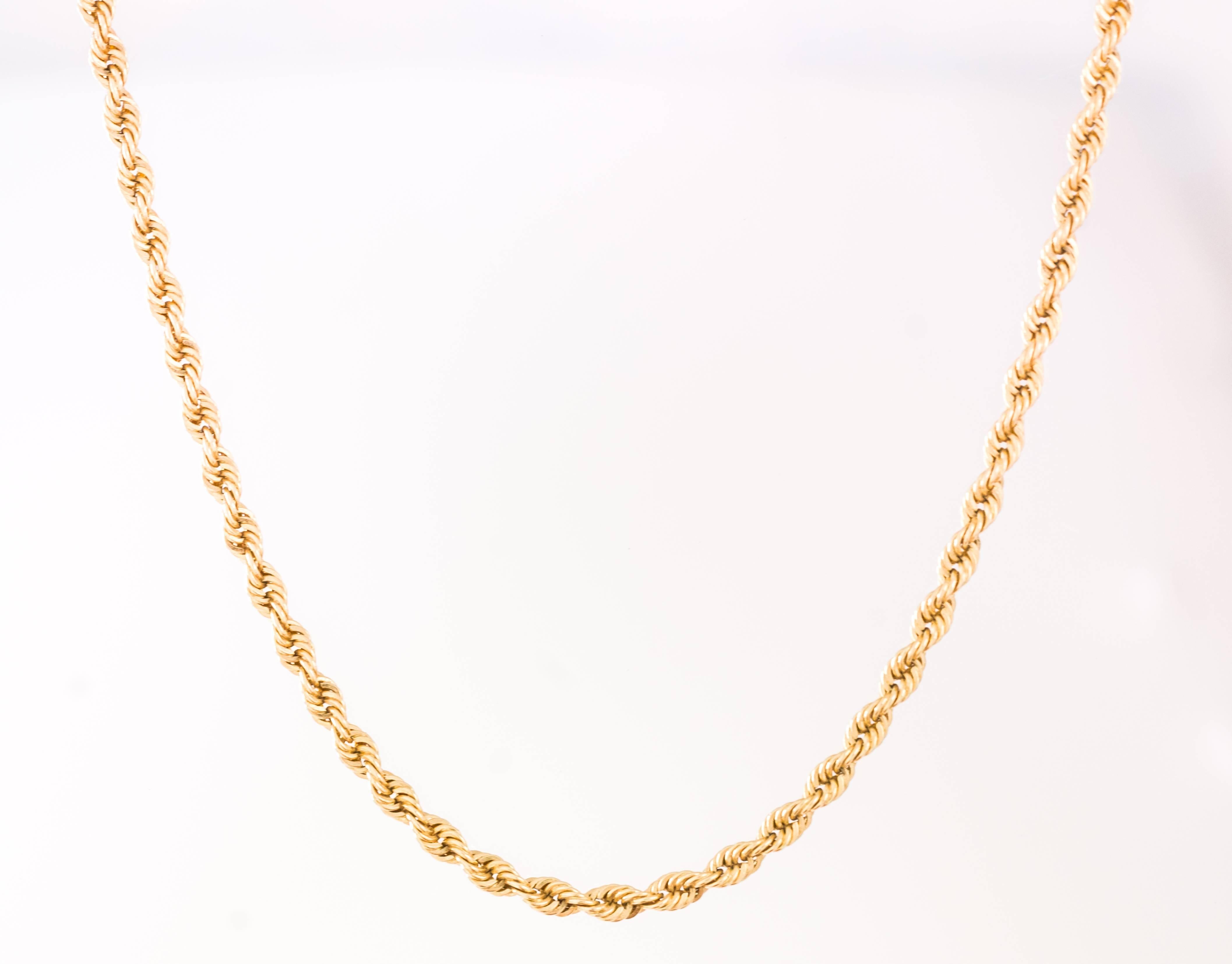 This vintage 1980s Tiffany and Co. Classic Rope Chain Necklace has 11.1 grams of 18 karat yellow gold. This necklace measures 15 inches long, 2.5 millimeters thick and is hallmarked Tiffany & Co. 750. This timeless piece of jewelry is from Tiffany's