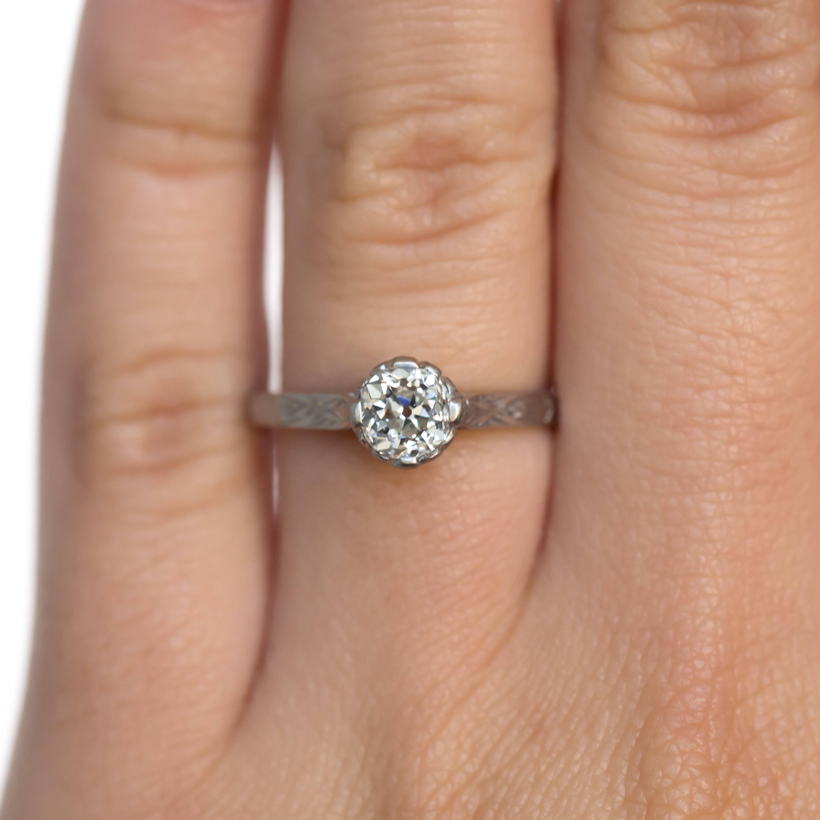 Edwardian GIA Certified .59 Carat Diamond Platinum Engagement Ring For Sale