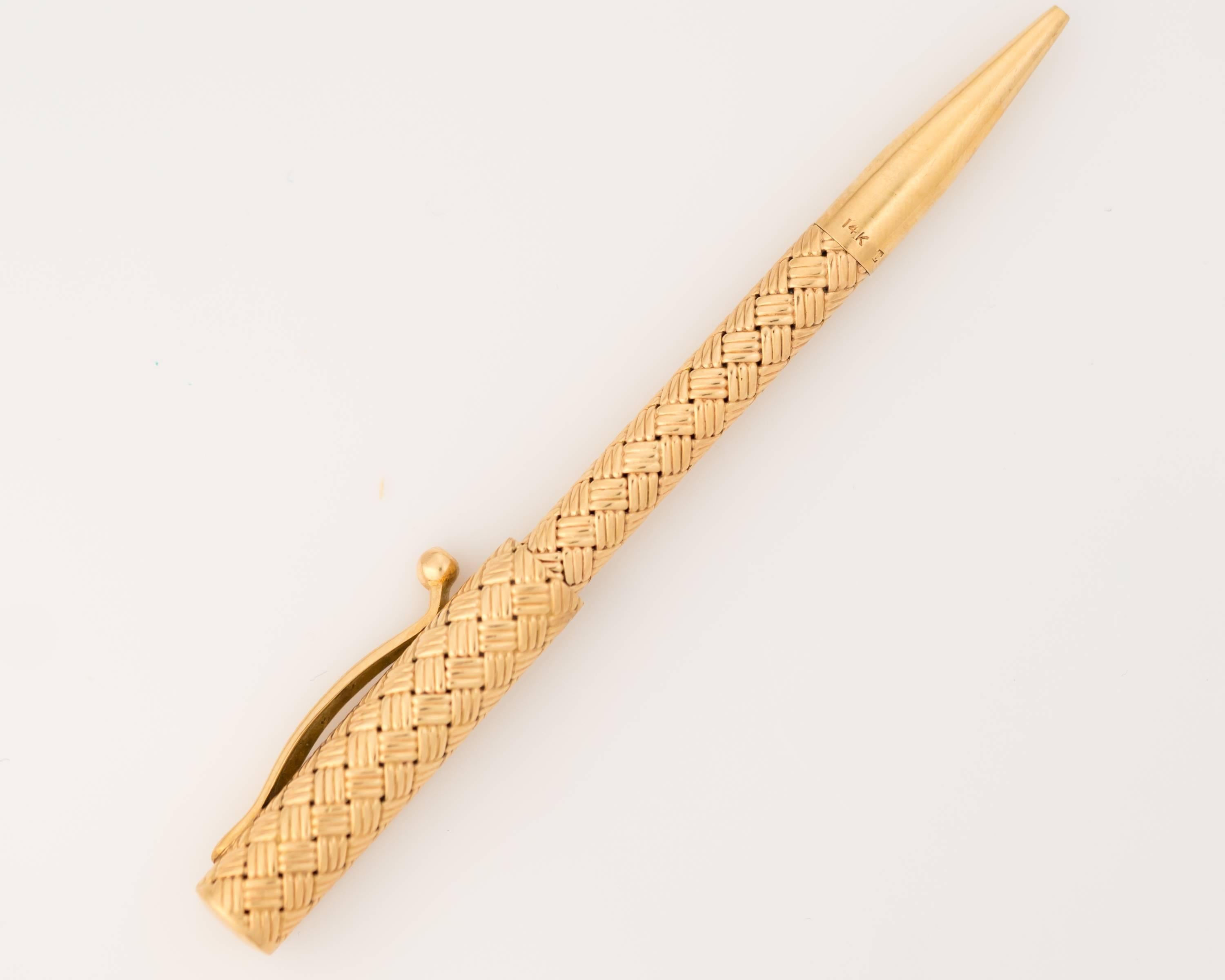 This 1930s Retro Tiffany and Co 14 Karat Yellow Gold Pen is simply gorgeous! It measures 3.5 inches long with the cap on and comes blank. It features a classic pattern. This is a lovely collectors piece. 


Item Details:
Metal: 14 karat yellow