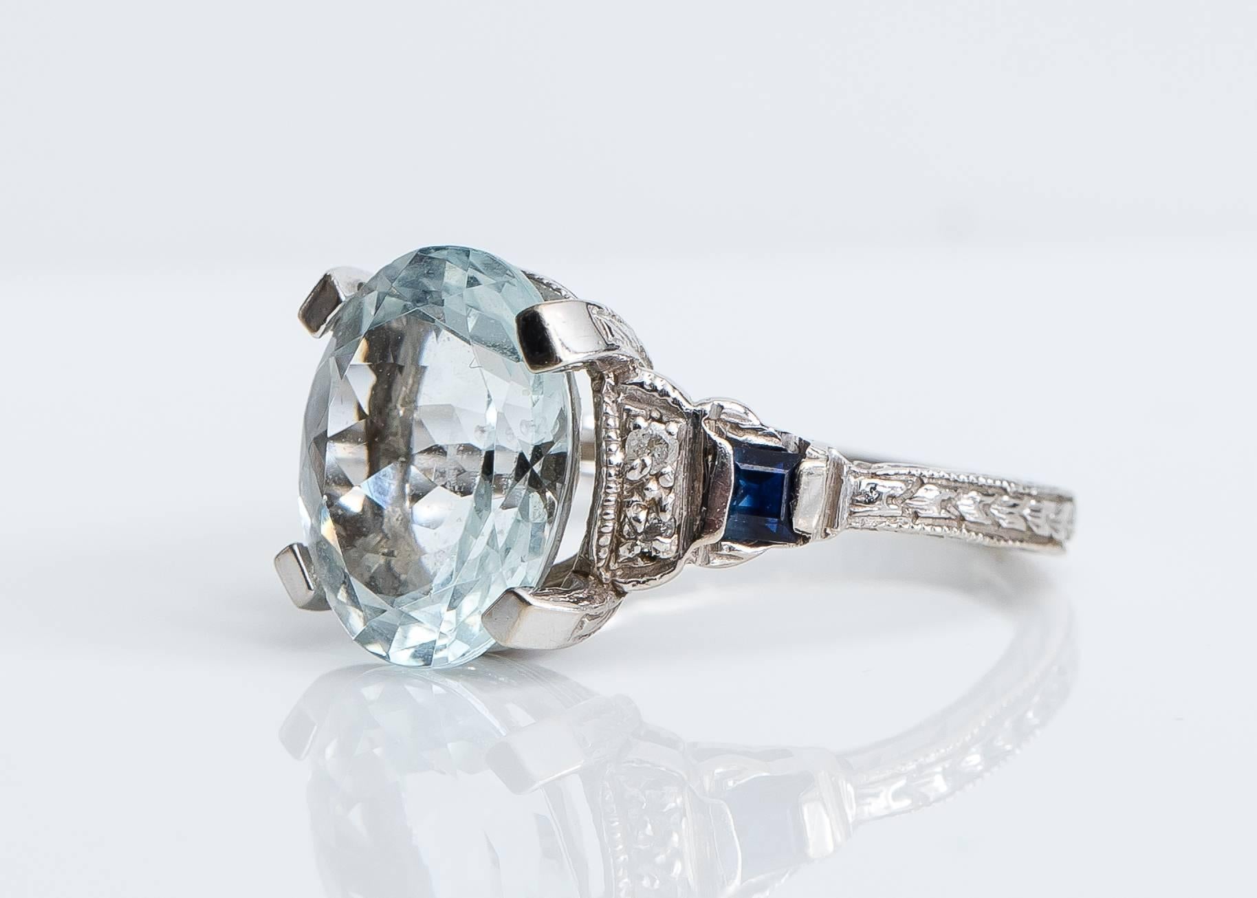 Retro 1950s 3 Carat Oval Aquamarine, Diamond and Sapphire 14 Karat Gold Ring