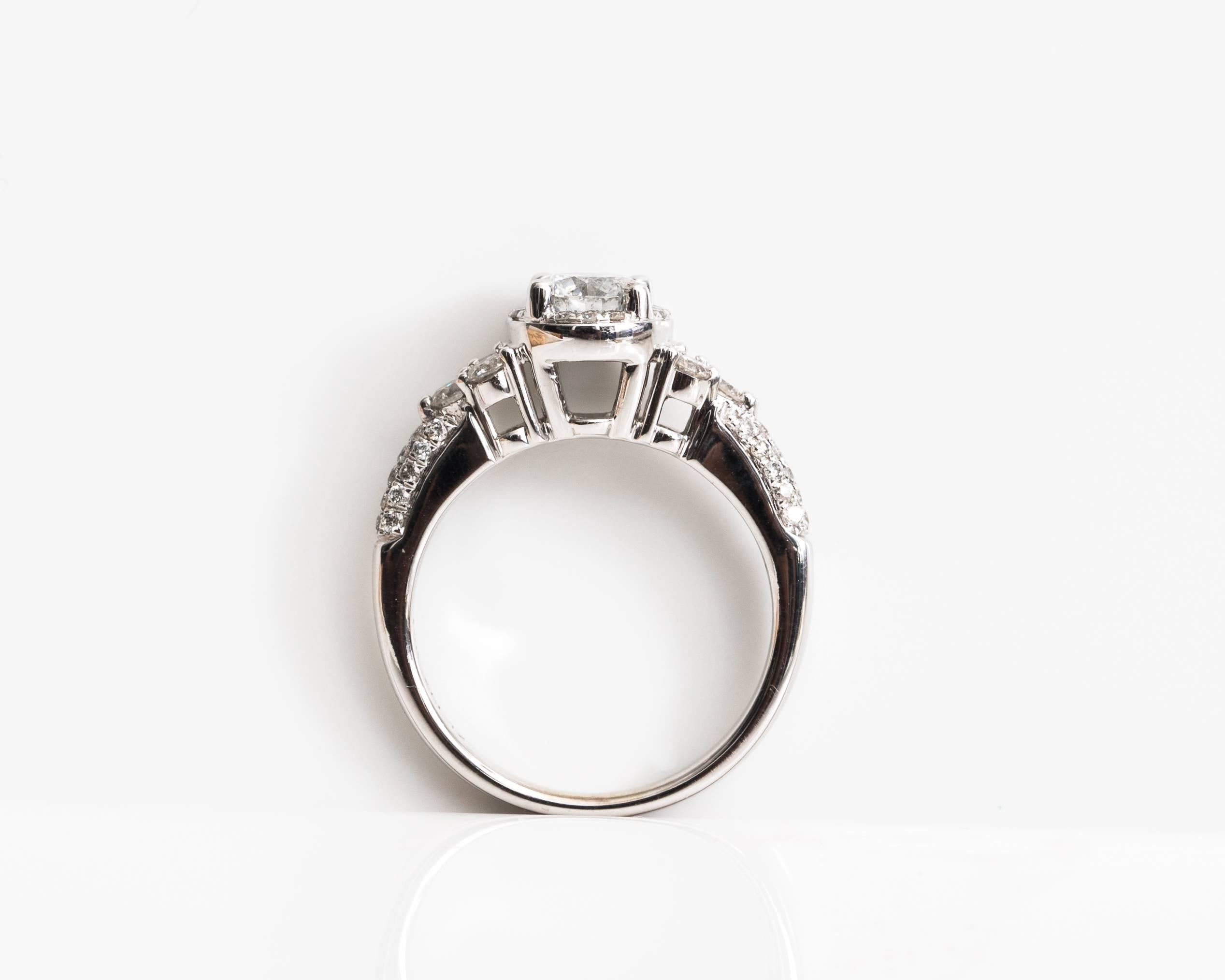 Modern 1.20 Carat Diamond Halo and 14 Karat White Gold Engagement Ring For Sale