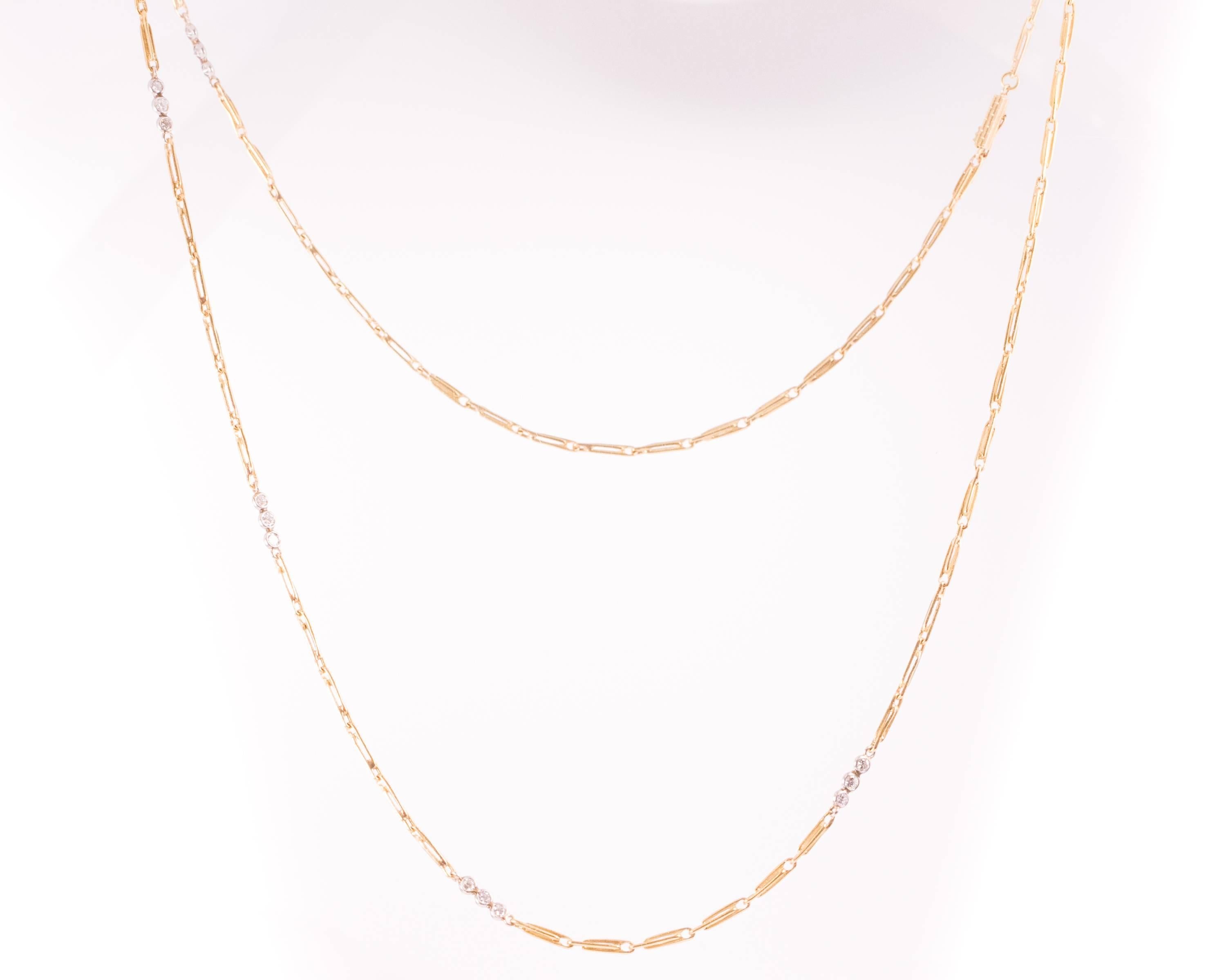 This 1930s Art Deco 18 karat yellow gold link Necklace features Transitional European cut Diamonds. Each handmade gold link is comprised of two interlocking links. 
Features a total of 1.00 carat of Transitional European cut diamonds, these are