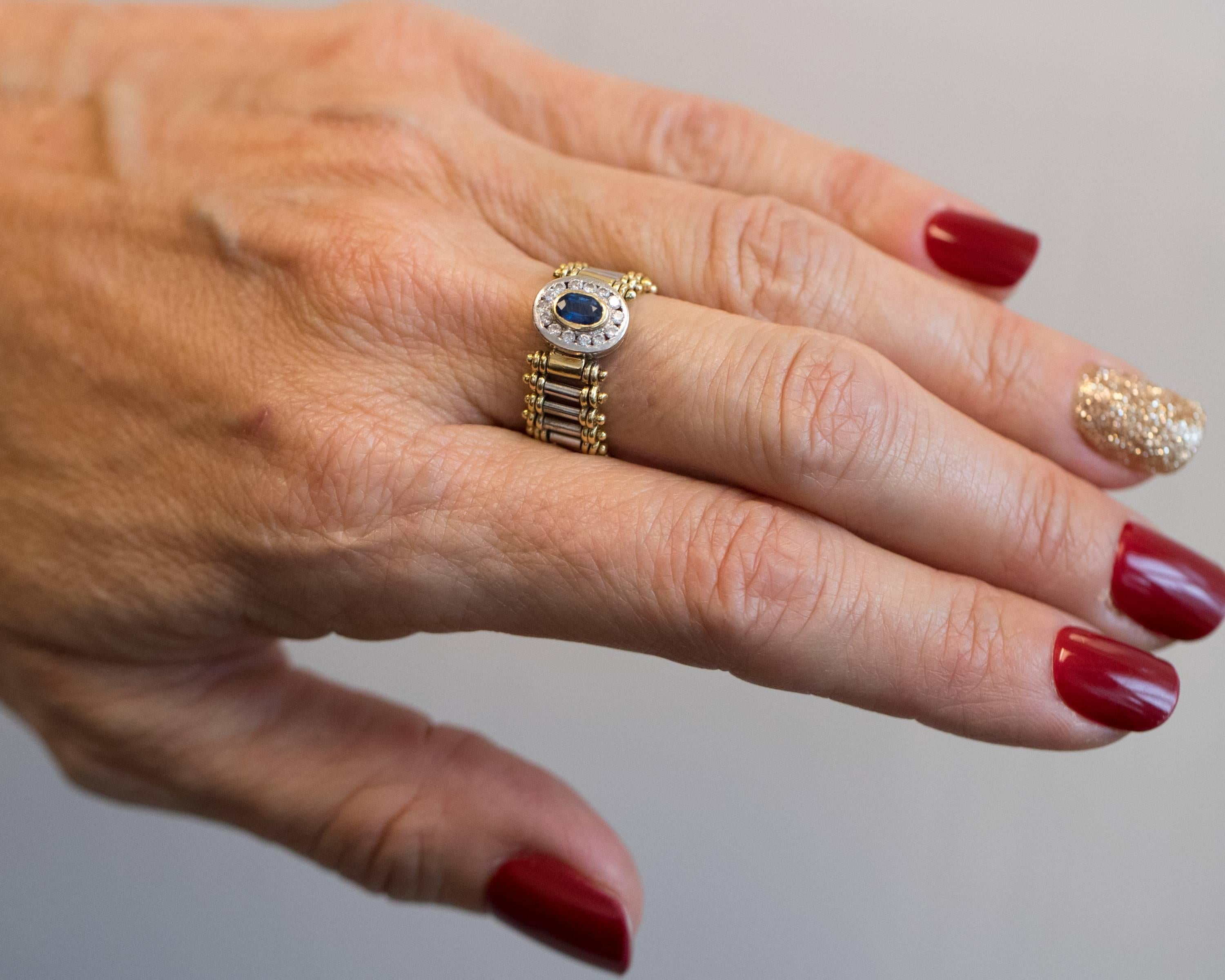 1980s Oval Sapphire and Diamond Halo 18 Karat Gold Flex Ring For Sale 1