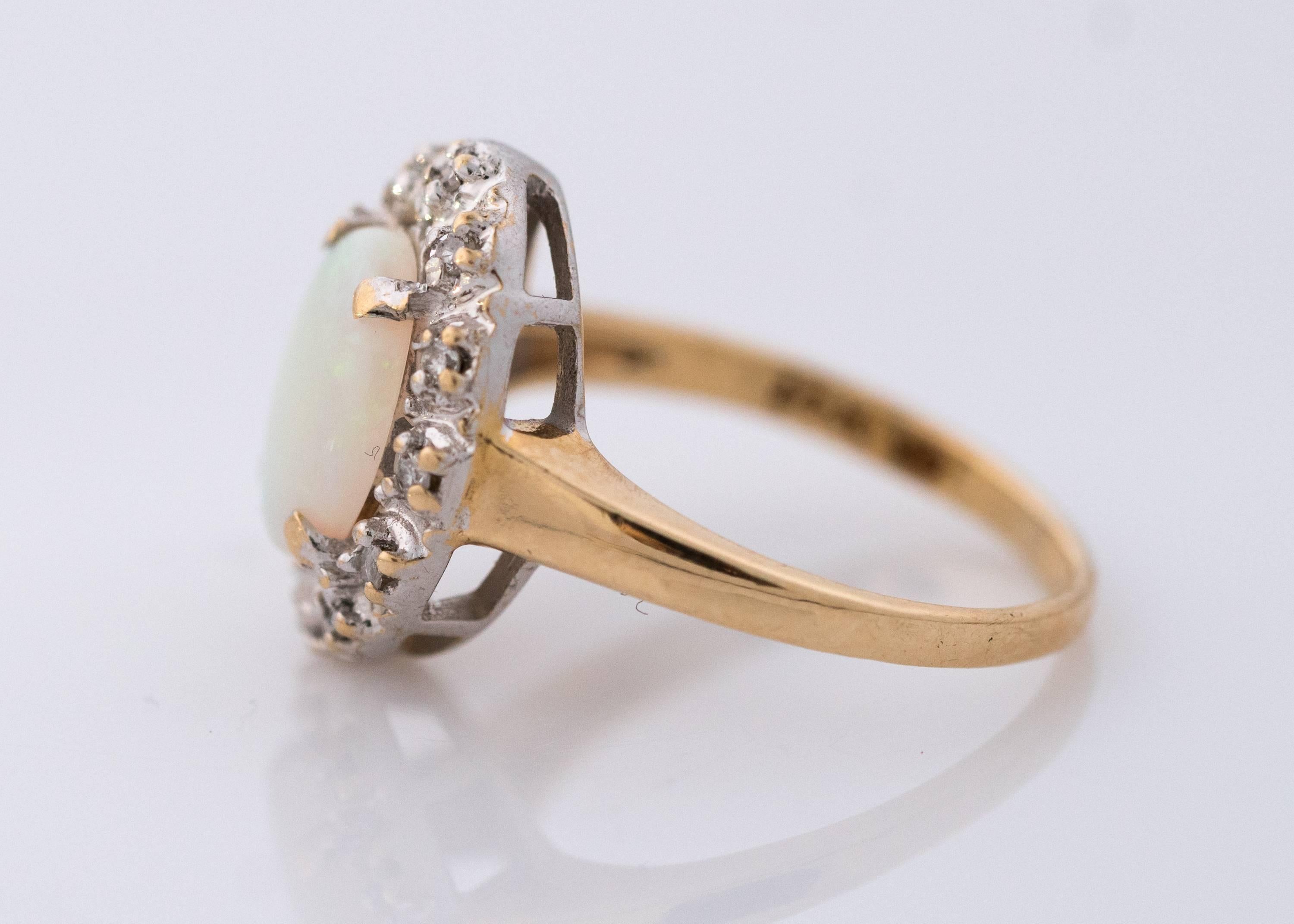 1960s Opal and Diamond Halo 14 Karat Yellow Gold Ring In Good Condition In Atlanta, GA