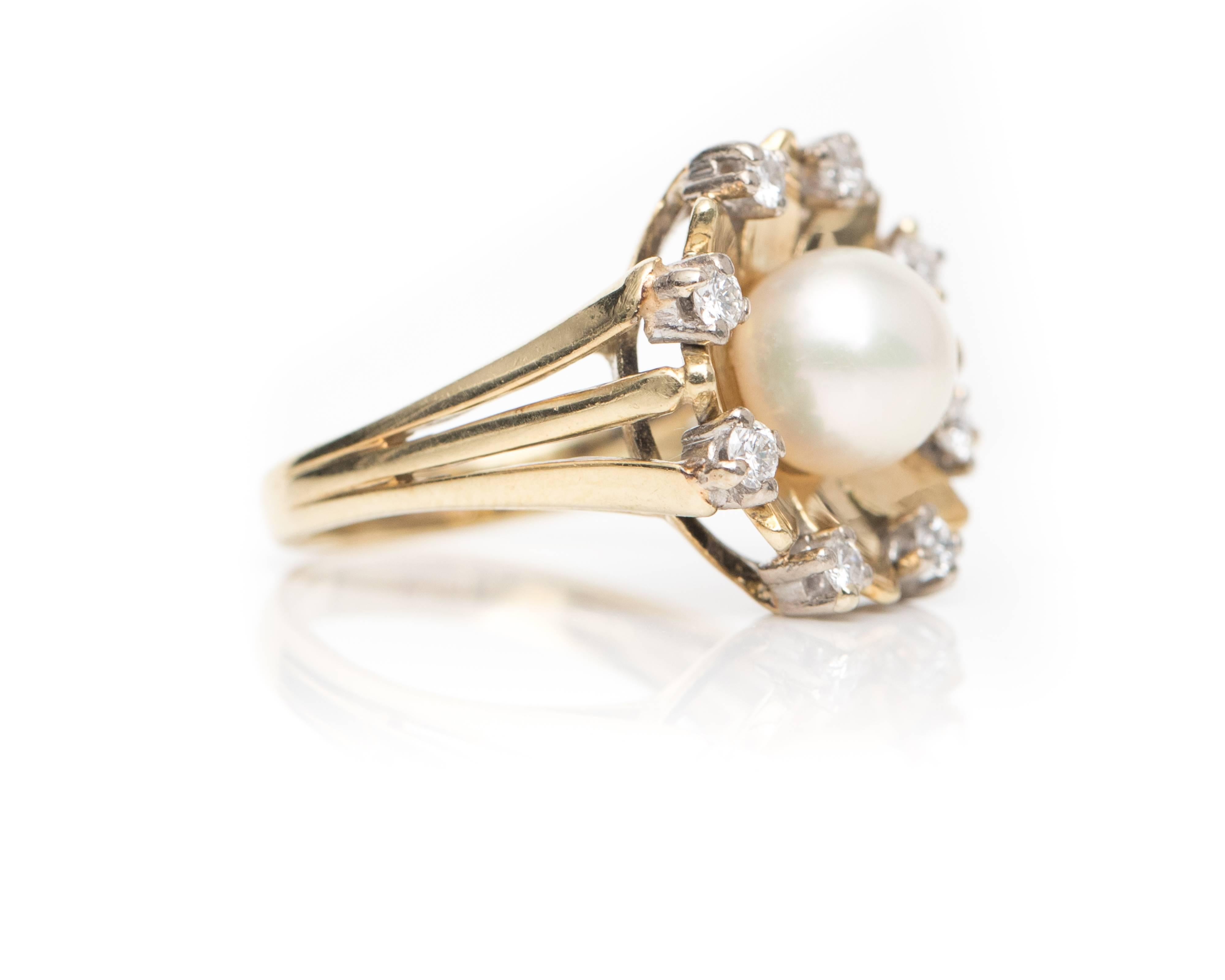 1960s Retro Pearl with Diamond Halo, 14 Karat Yellow Gold Ring. Features a 7 millimeter Pearl in a Floral motif setting. The Pearl is surrounded by 8 Gold Petals. A single, prong set Diamond separates each petal at the tip forming an 8 Diamond Halo.