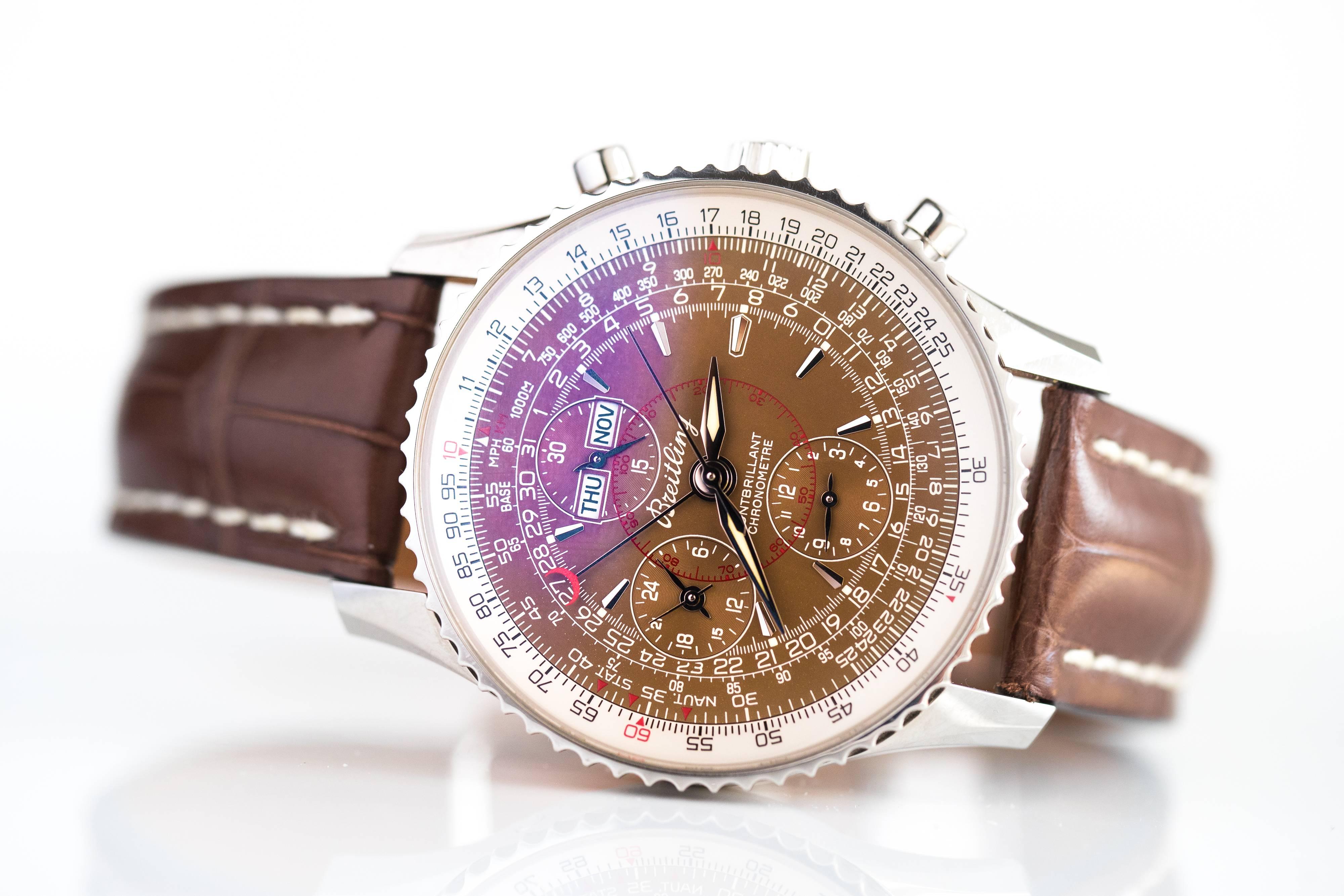 2011 Breitling Montbrillant Navitimer Datora Watch. Features a 43 millimeter case, Bronze Stick Dial with Luminous Hands and Dial Markers, Brown Crocodile Band with Deployment clasp, Bidirectional rotating Aviation Slide Rule bezel, Chronograph,