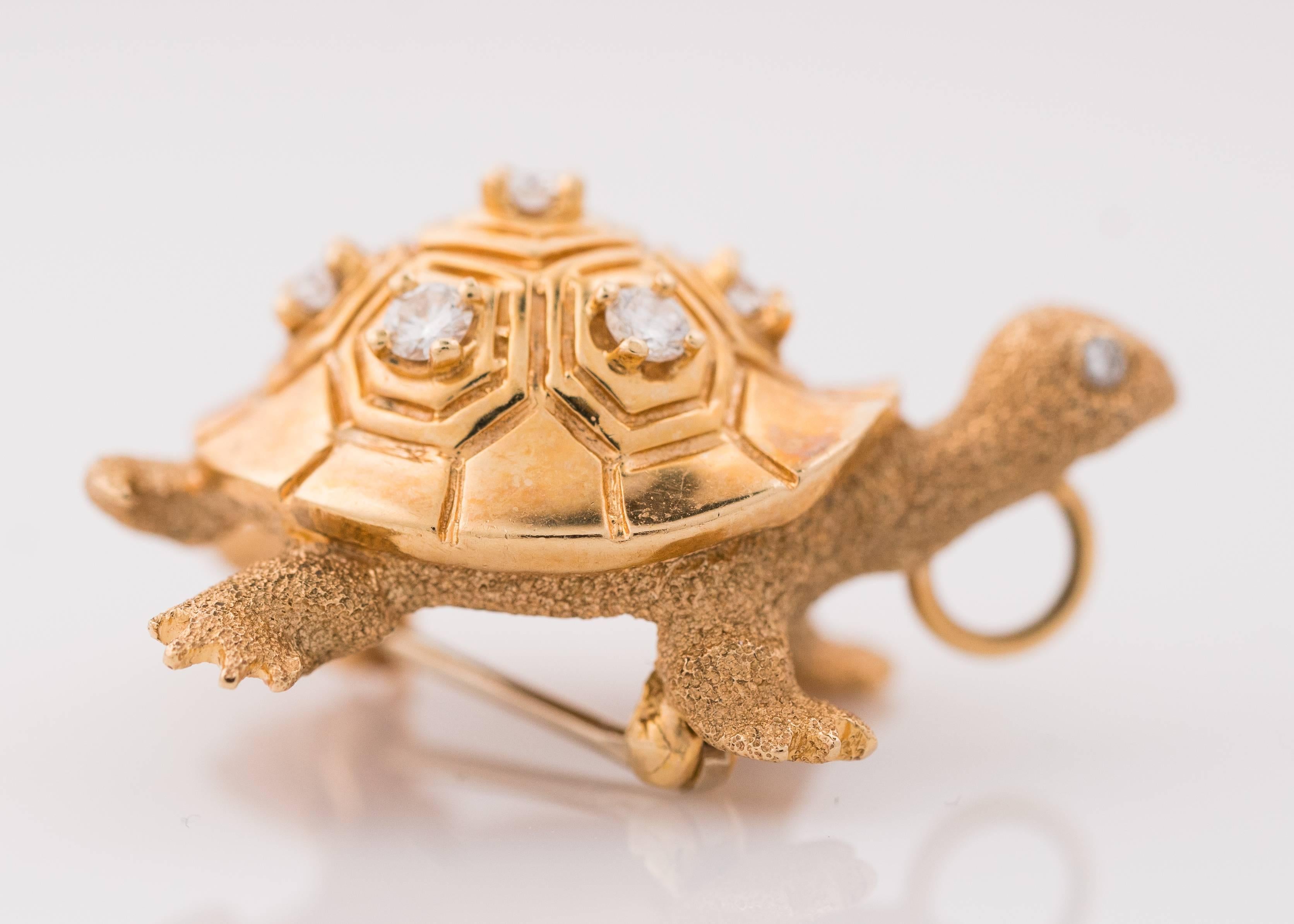 1950s Turtle Brooch, 14K Yellow Gold and Diamonds. Features .40 carats total weight of Round Brilliant Diamonds. This exquisitely detailed Turtle Pin has Sand Finish legs, head, tail and body. The high polish shell is engraved with traditional