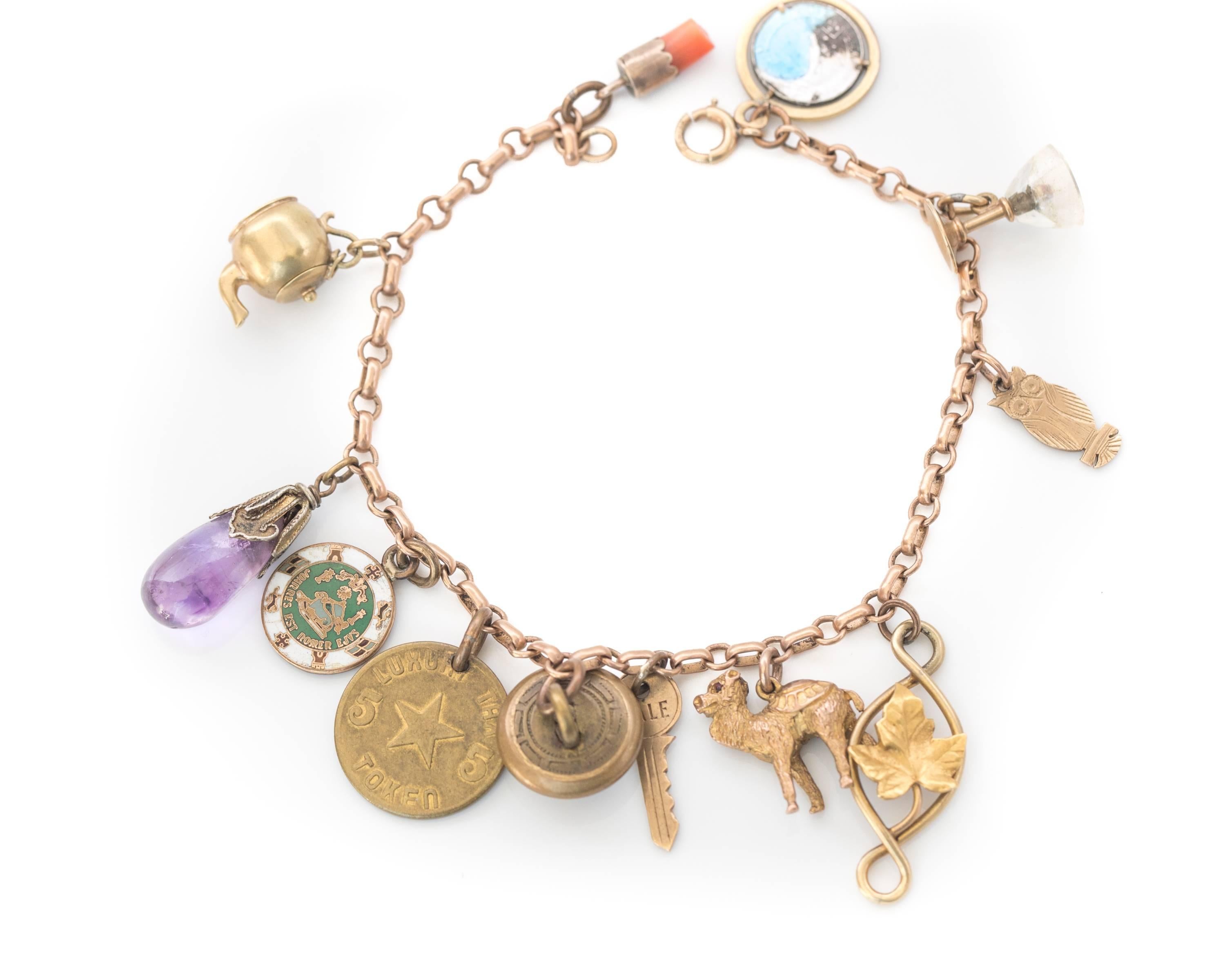 1890s Victorian Charm Bracelet in 9 Karat and 14 Karat Yellow Gold In Good Condition In Atlanta, GA