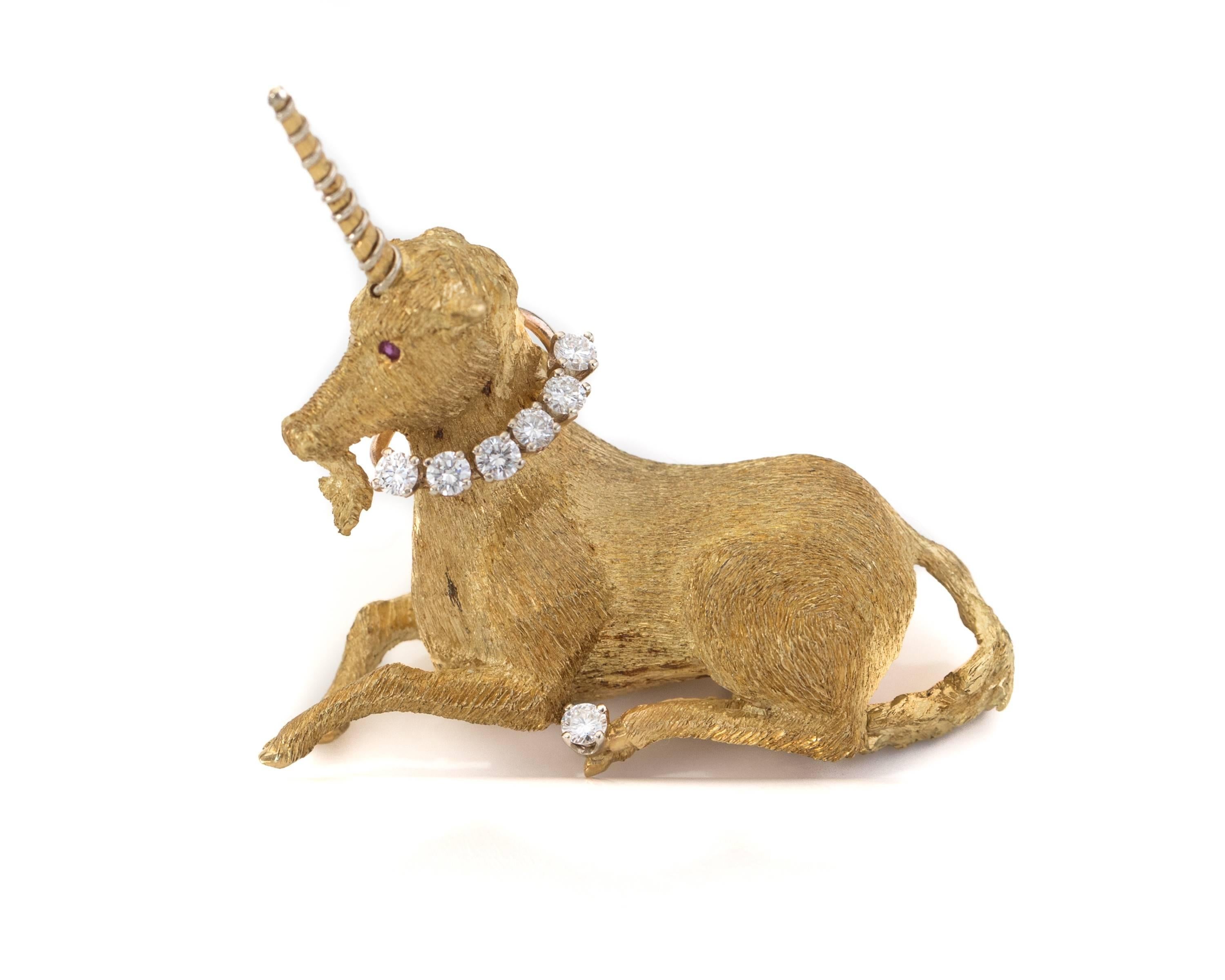 1970s Vintage Tiffany and Co. 18K Gold, Diamond and Ruby Unicorn Brooch. Features .70 cttw Diamonds, 2 Rubies and a richly textured 18K Gold Body. Lapel Pin or Brooch, this is a versatile stunner!

This exquisitely detailed Magical Unicorn brooch is