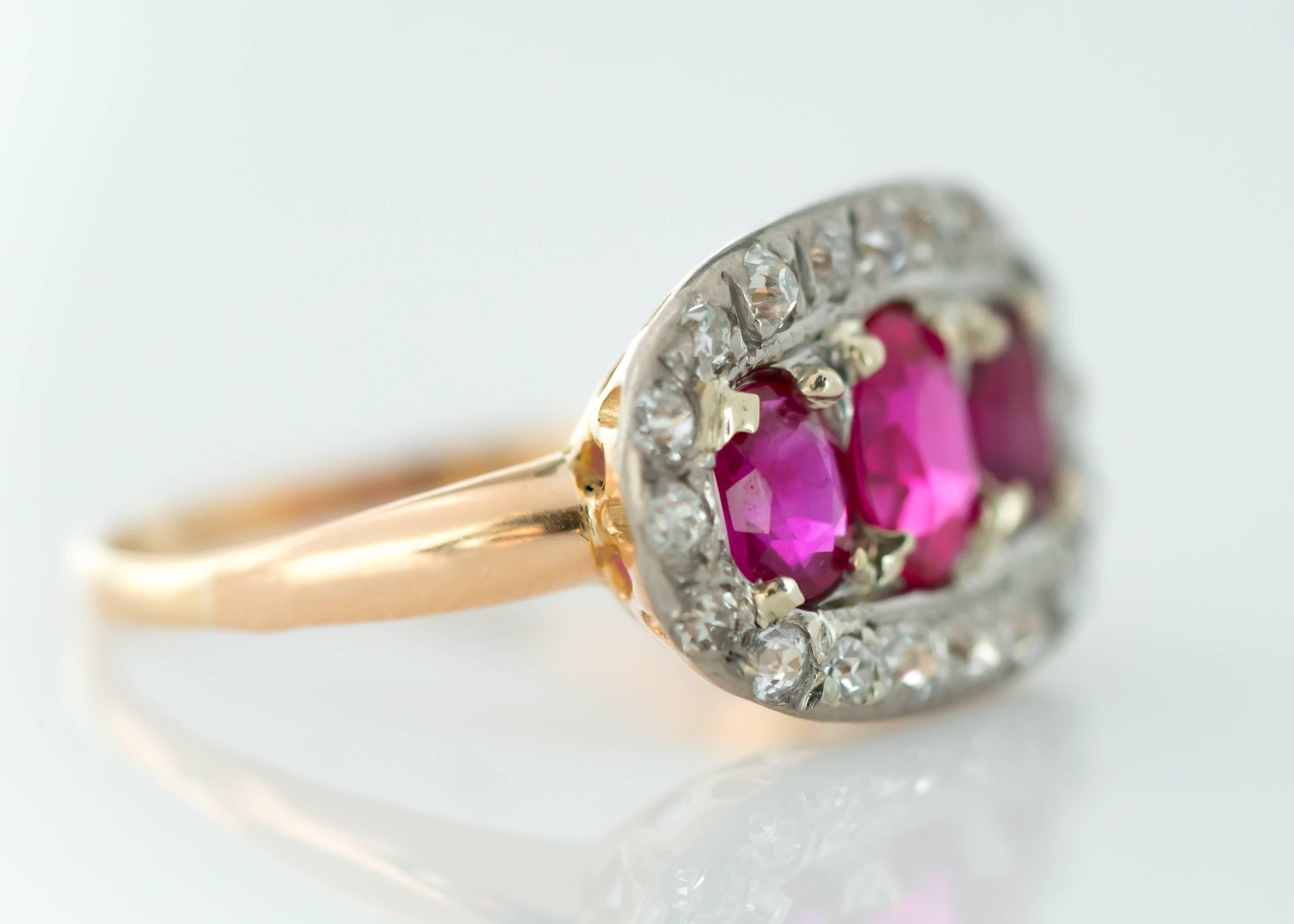 Antique 1910s Edwardian Ruby ring with Old Mine Diamond Halo

Features 3 Oval Rubies surrounded by an Old Mine Diamond Halo. This ring has a Platinum top with an 18 Karat Yellow Gold back and shank. Fine filigree detail forms a delicate gallery