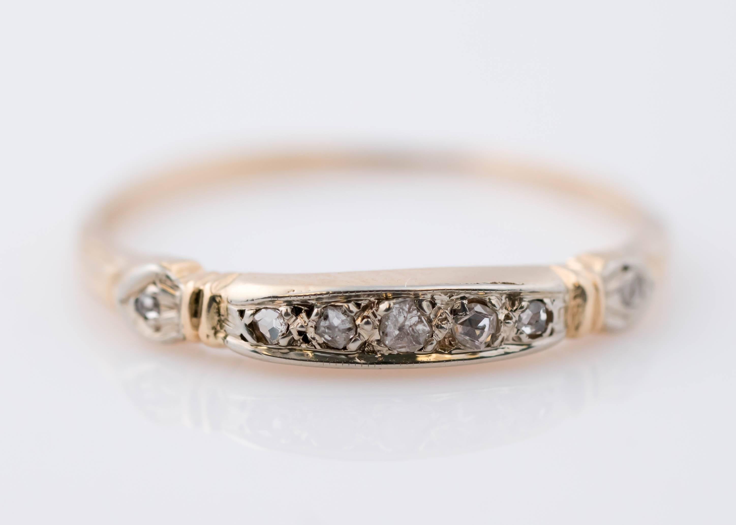 1900s Edwardian Wedding Band Ring - 14 Karat Yellow and White Gold, Rose Cut Diamonds
Features a 14 karat yellow gold shank and a 14 karat white gold head embracing .10 carats of Rose cut Diamonds. 
This dainty ring has a symmetrical and delicate