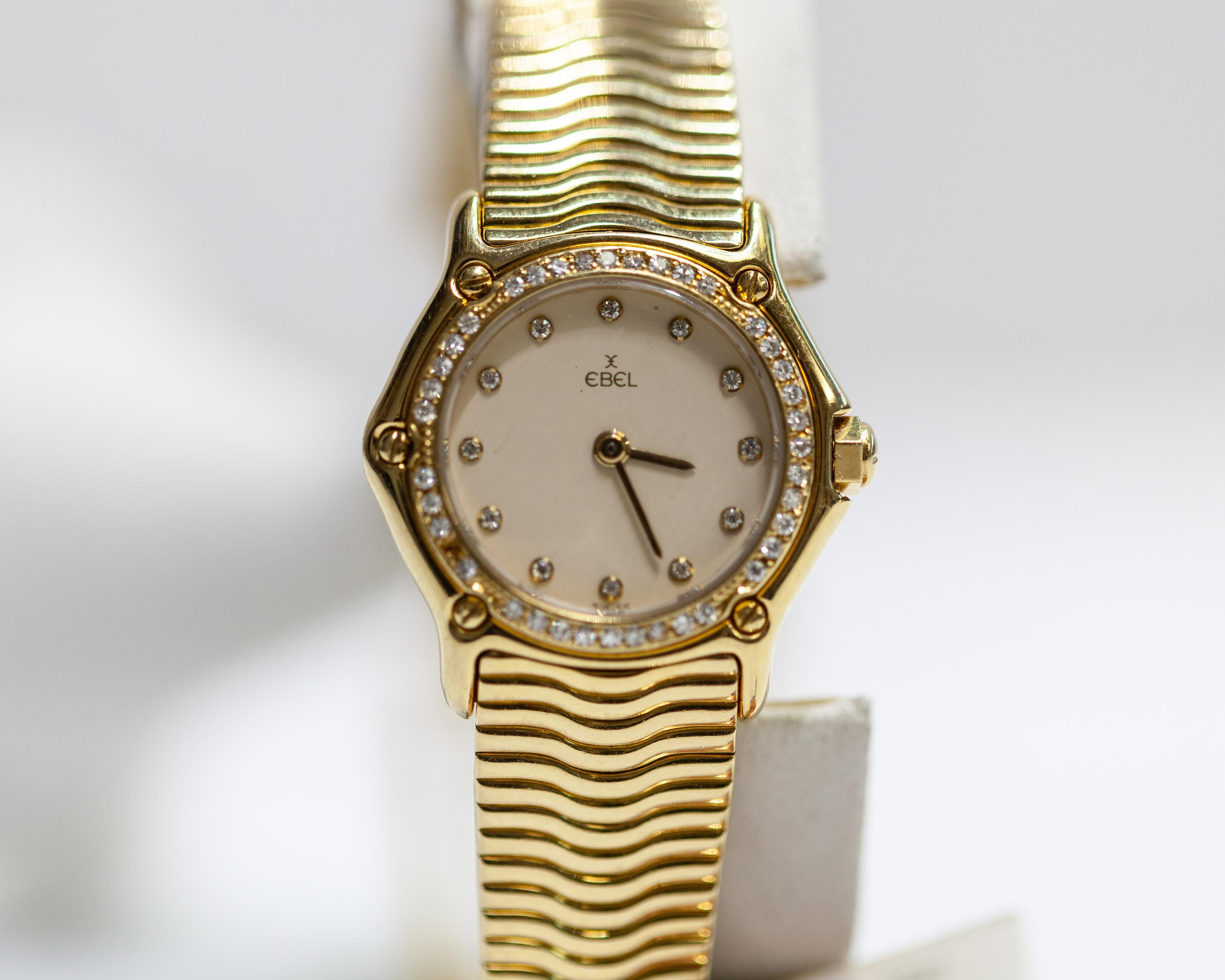 Basic Info
Listing number	NB00005
Brand	                EBEL
Movement	        Quartz
Case Material	        18k Yellow Gold
Bracelet material	18k Yellow Gold
Condition	        Good (Light signs of wear or scratches)

The scope of delivery	No original