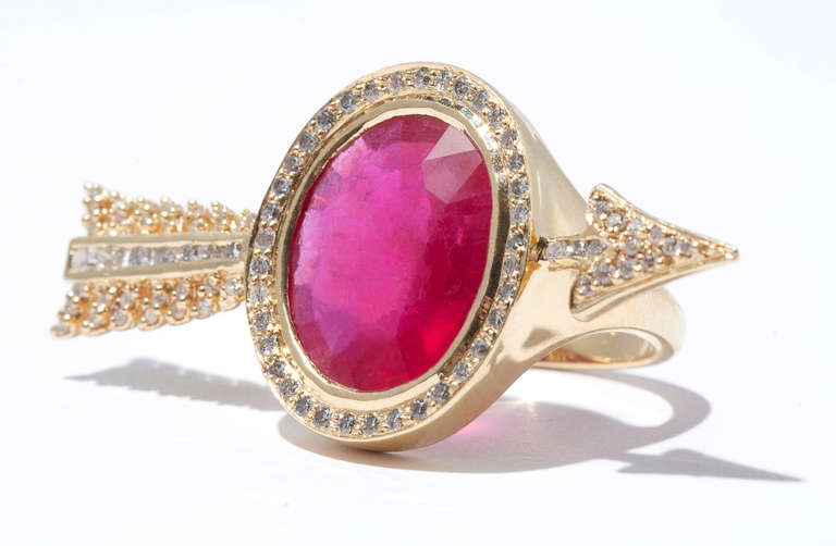 This signature Arrow Ring features a beautiful 9.92 carat Ruby framed beautifully with 0.55 carats of pave set Diamonds. In 22k gold this ring is the epitome of luxury and opulence as well as being wearable and stylish.