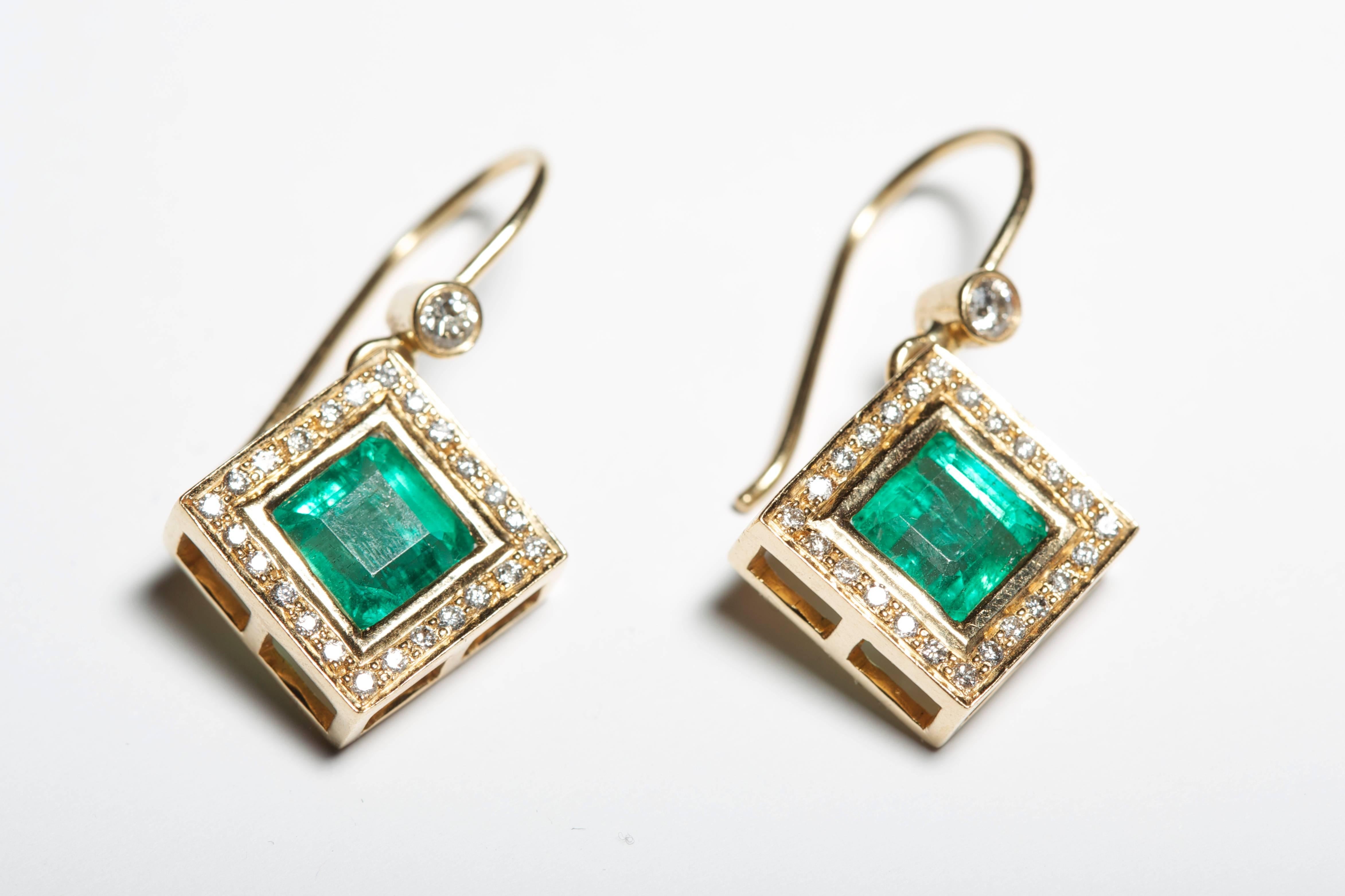 Stunning and elegant diamond and emerald earrings. Perfect for adding class and glamour to any outfit. For the lady who likes understated decadence.  