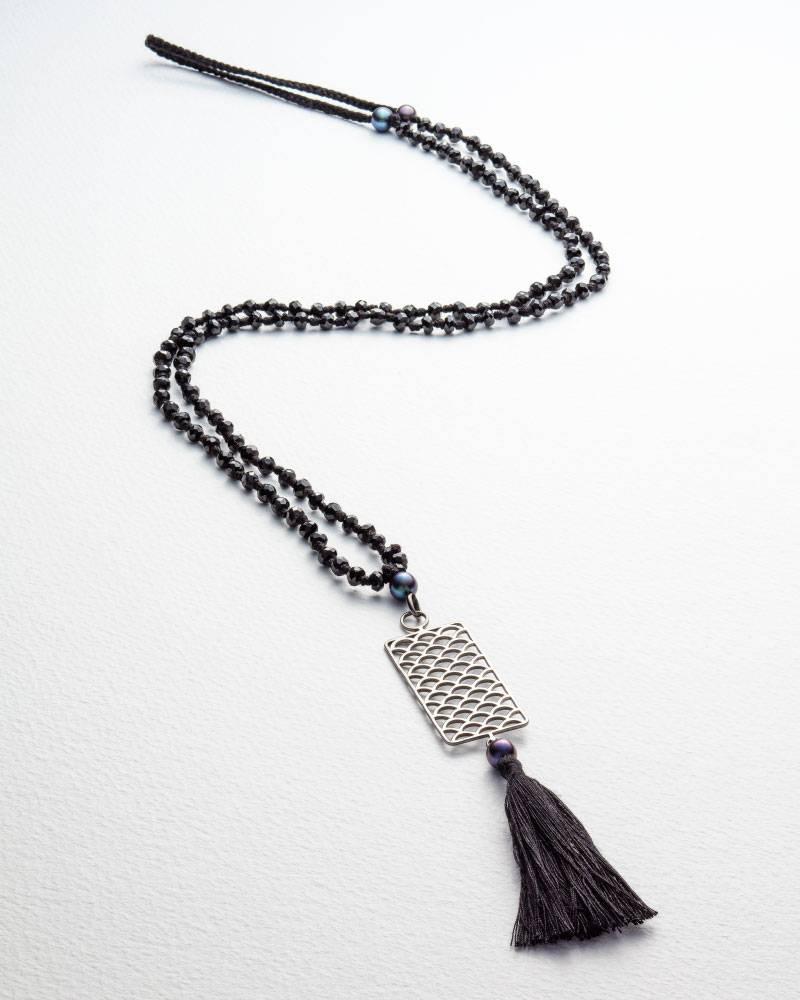 A pendant  from the SS16 jade Jagger Opium collection.
The pendant is sterling silver with black rhodium plate.
Black spinel, black pearls on black thread.
The thread length is 76cm.
Handmade in India.