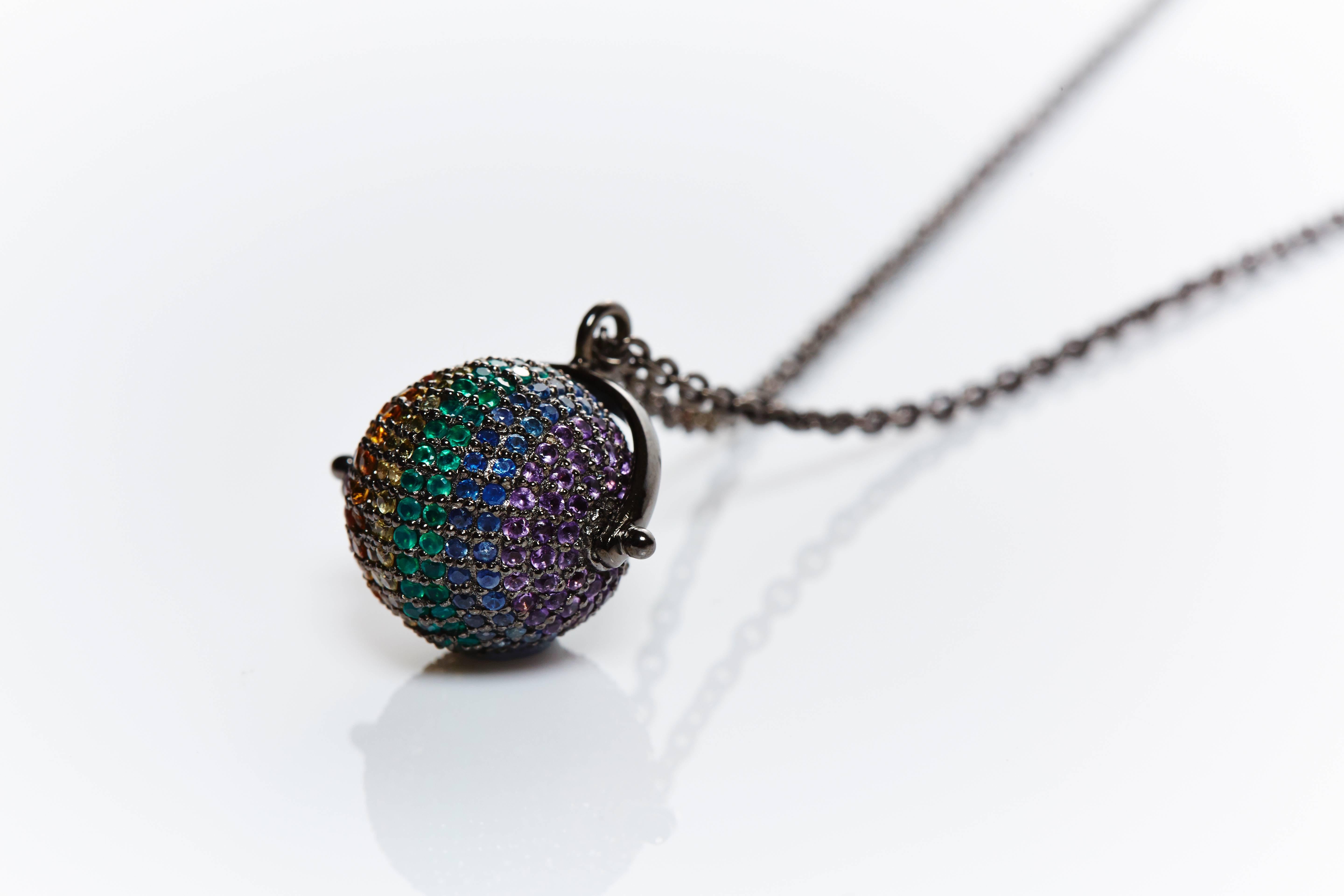 Jade Jagger Midnight Rainbow 14 mm Disco Ball Necklace. 
Black rhodium plated sterling silver with multi stone pave on 28 inch chain.
Ruby, citrine, yellow sapphire, green onyx, blue sapphire and amethyst. 
Handmade in Jaipur, India.
