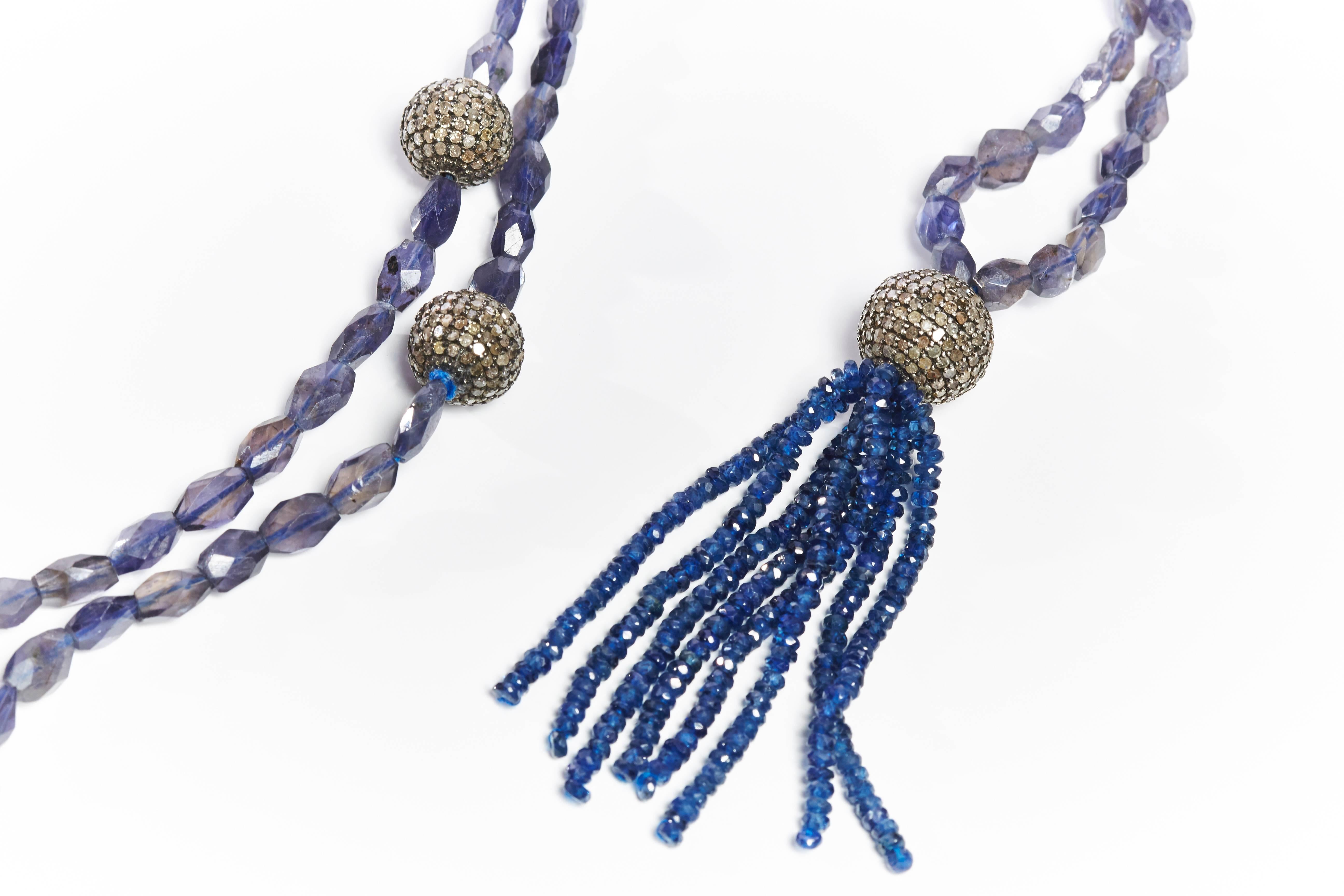 Jade Jagger Diamond and Sapphire Disco Ball Tassel Necklace featuring sapphire beads.
From the Disco Ball Collection.
Handmade in India.
35.2 ct. sapphire
172.5 ct. lolite