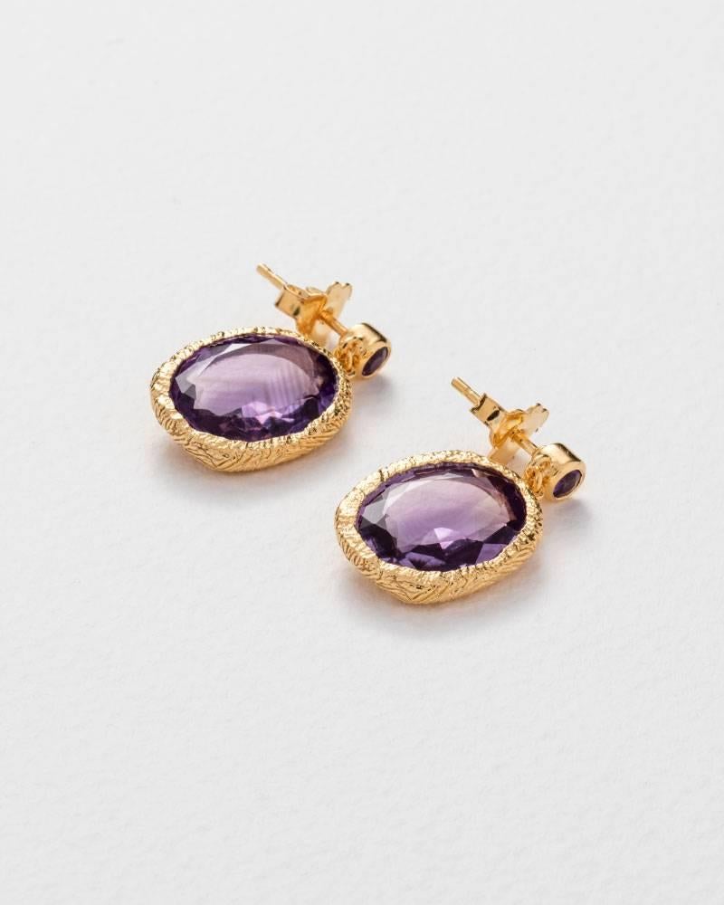 From the SS16 Jade Jagger Maiden collection.
The gold vermeil earrings feature beautiful irregular amethyst stones.
Carefully handmade by skilled craftsmen in Jaipur, India.