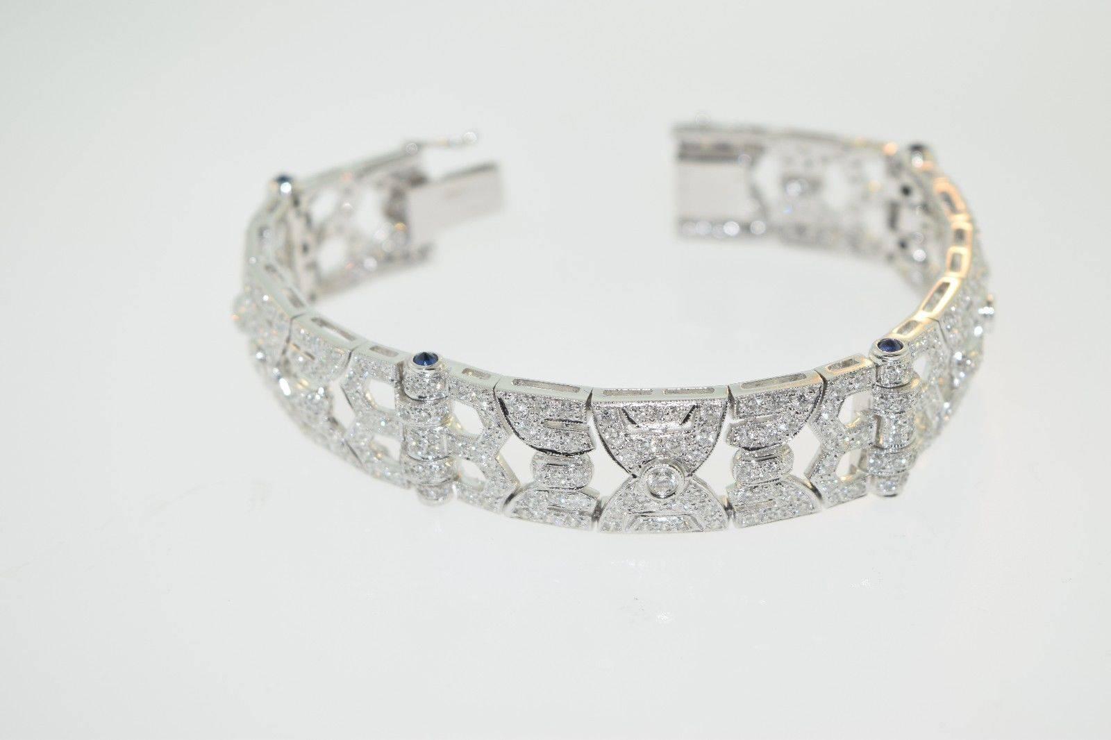 Art Deco Diamond Studded Bracelet w Sapphires 

Stunning Art Deco Diamond and Sapphire Studded Bracelet handcrafted to Perfection. 18k White Gold promises a Lasting Shine. Make a standout addition to your collection with this Bracelet.

Metal: