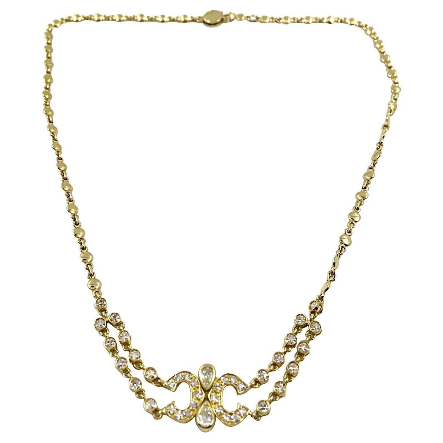 1980s Cartier Diamond Gold Double "C" Necklace For Sale