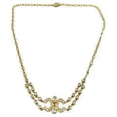 1980s Cartier Diamond Gold Double "C" Necklace