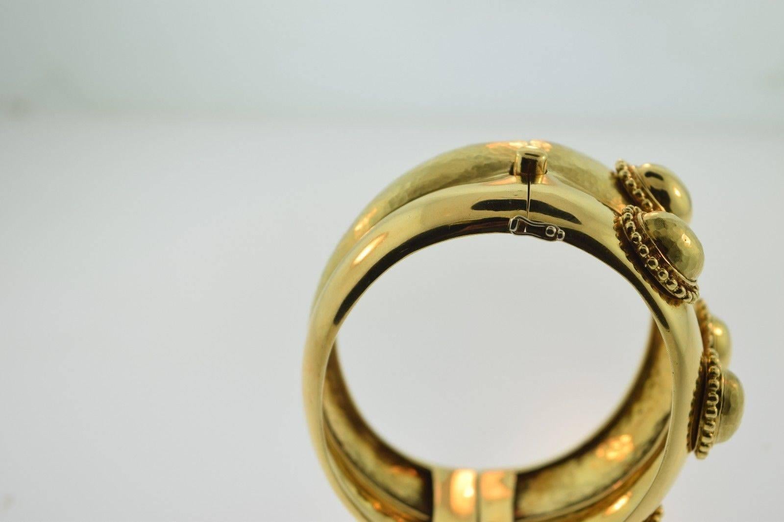 About the Item:
Hand-Crafted to a Standard of Perfection, this 18k Yellow Gold Textured Wide Bangle/Bracelet will instantly put you in the spotlight. Signed by designer CIT and made exclusively in Italy. A rare and absolutely amazing addition to