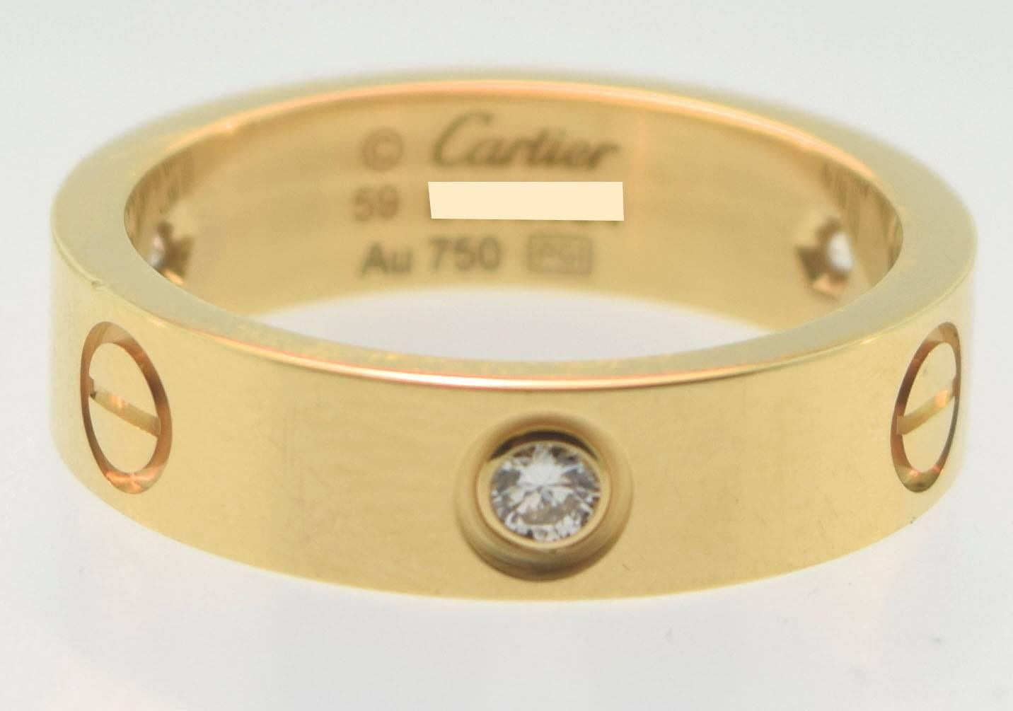 Cartier LOVE Ring, 3 Diamonds, Yellow Gold, Size 9 In Excellent Condition For Sale In Miami, FL