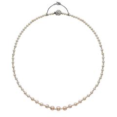 Natural saltwater pearl necklace with diamond clasp