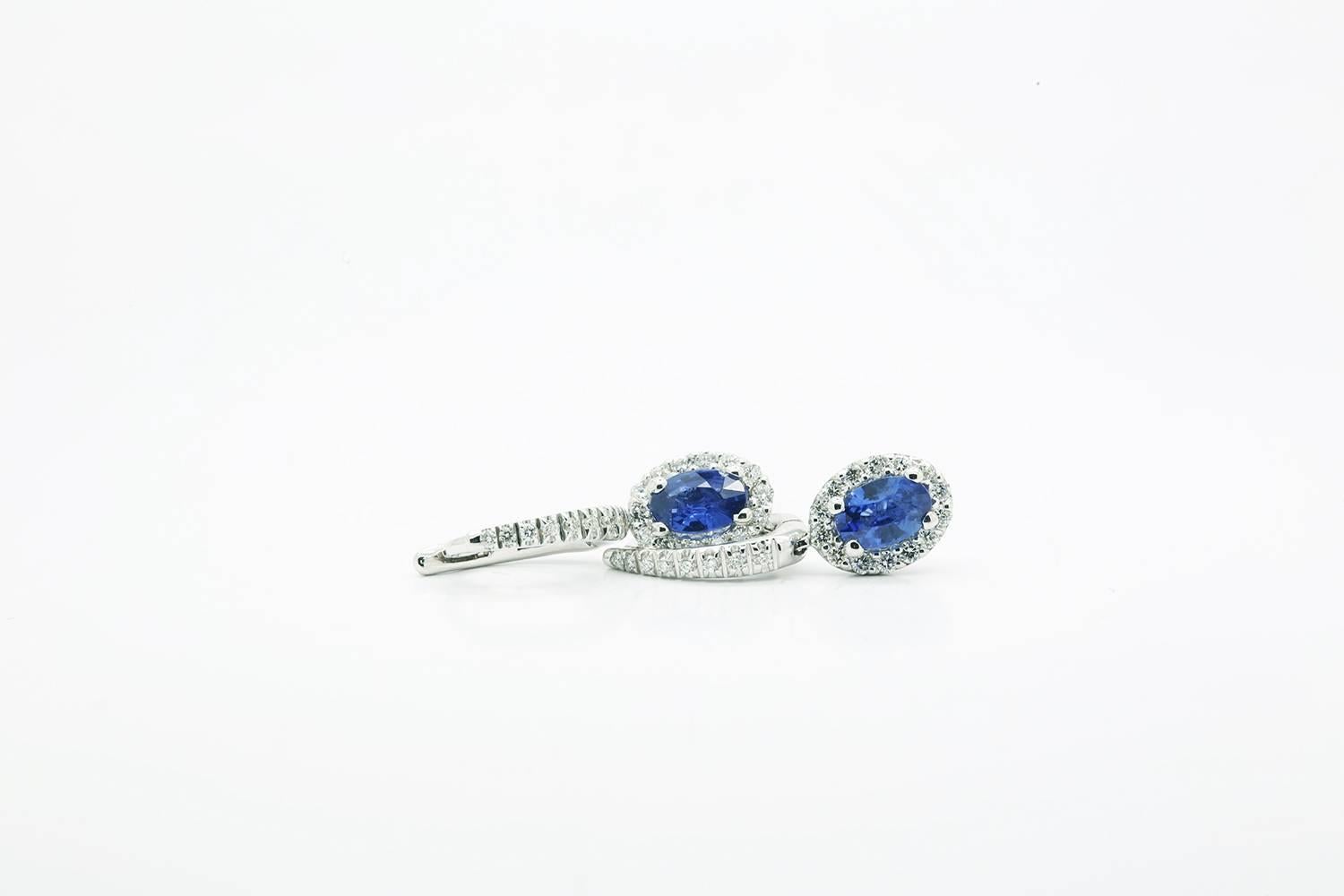 Blue Sapphires dangling earrings in 18k white gold by FERRUCCI & CO. with bright white diamonds, fine and elegant, Made in Italy

Diamonds total carat weight 0.46 ct

Blues Sapphires carat weight 1.10 ct

 