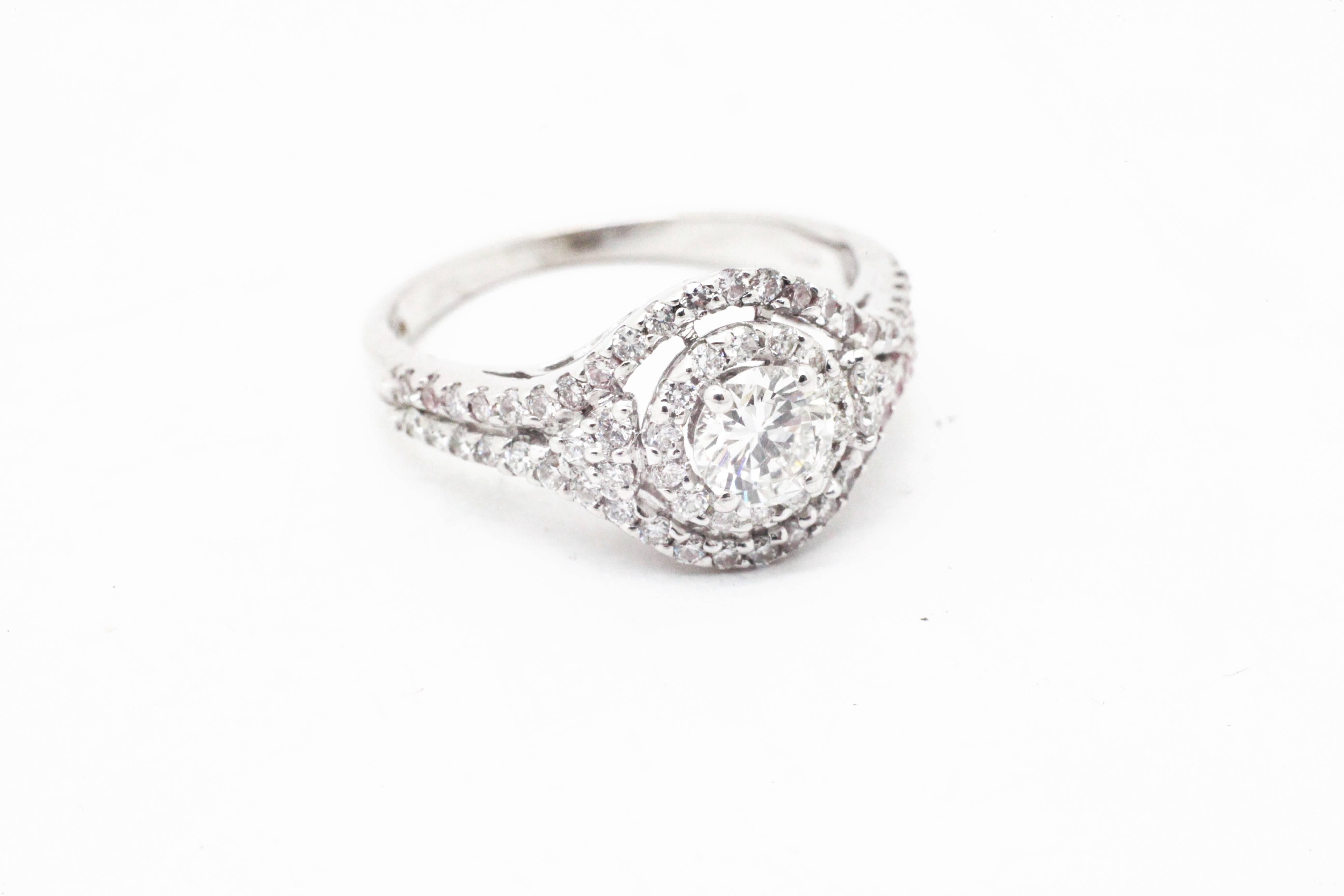 This FERRUCCI Diamond ring is conceived in 18k white gold, showcasing clear white diamonds for a total carat weight of 0.98 carats, hand crafted in Italy,

SIze 6 complimentary adjustable upon order
