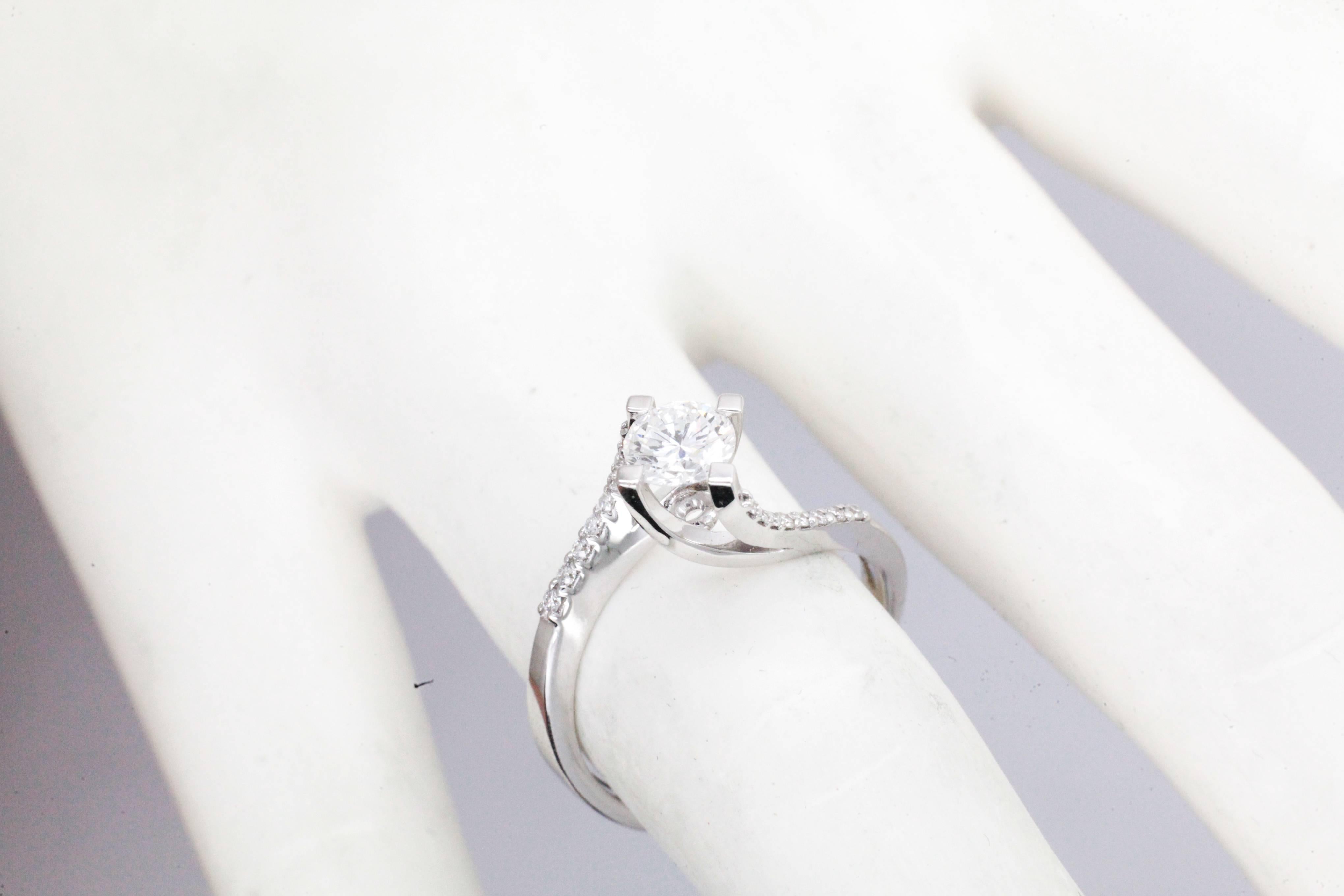 0.58 Carat white Diamond 18k white Gold Engagement Ring 1