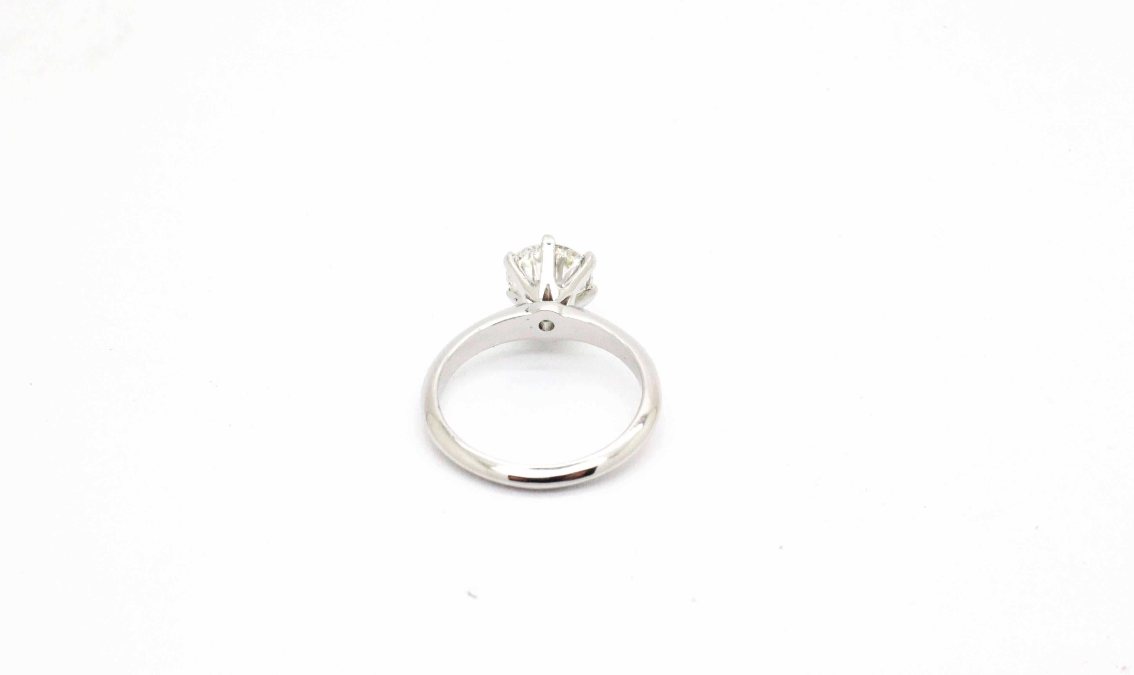 Perfectly hand crafted Platinum solitaire engagement ring by FERRUCCI, 
with six claw shaped prong and classic, everlasting, style shank.
Entirely made in New York City by Italian master jeweler showcasing a stunning
GIA Certified round brilliant