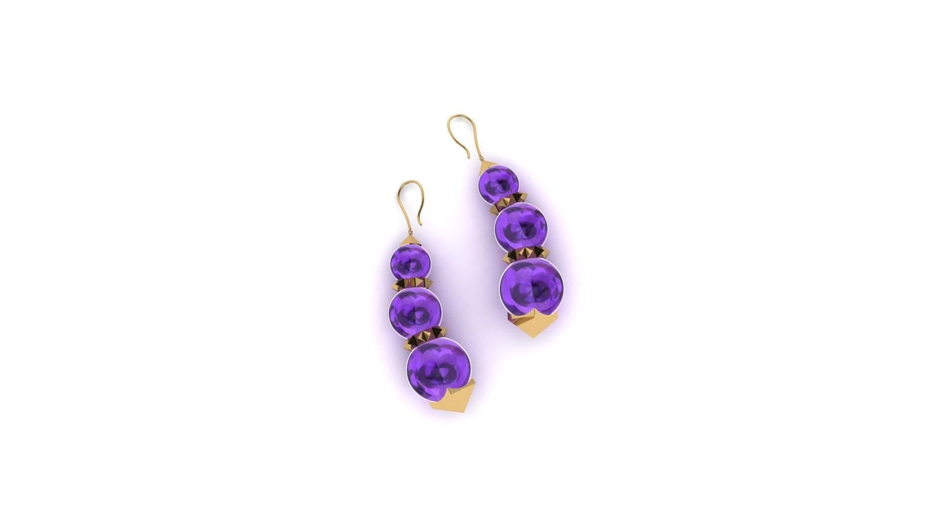 from FERRUCCI's collection Pyramid, 18k yellow gold and natural Amethyst beads earrings, hand made in New York.

Elegant and fashionable, a stunning spring and summer look for the innate classy taste of a strong woman.