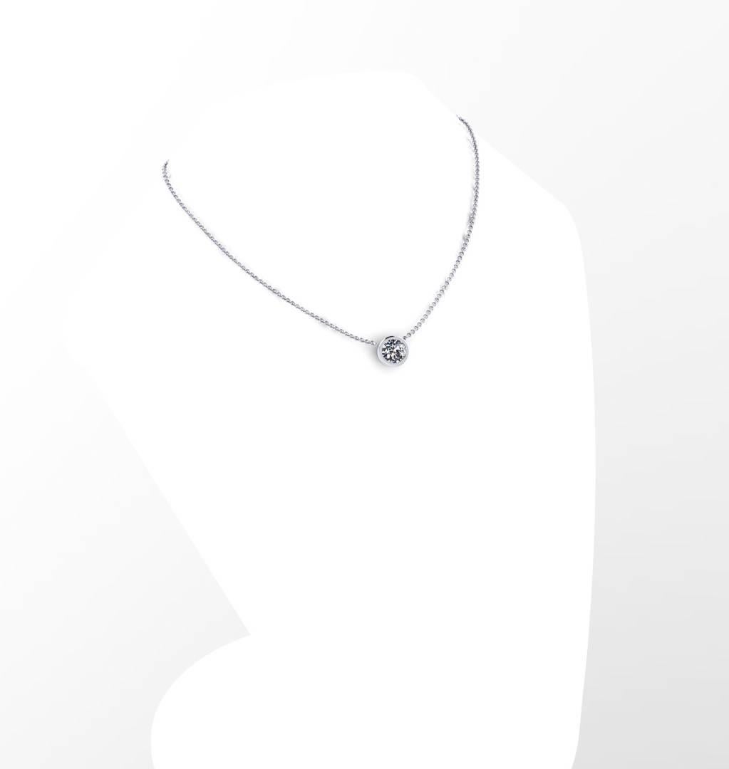 FERRUCCI IGI zertifiziert 1,22 Karat Diamant Halskette Anhänger, K Farbe, VVS2 Klarheit, in einer Lünette Einstellung Hand gemacht und Kabelkette in Platin.
Länge 18 Zoll, einstellbar auf 16 Zoll.