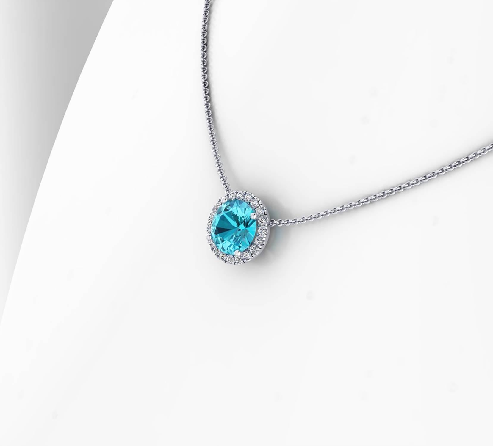Ferrucci 1.73 carat Natural Blue Apatite and bright white Diamonds halo, hand set for a total carat weight of 0.16 carats.

The necklace is made in 18k white gold, hand crafted in New York City by master jeweler Francesco Ferrucci, with a 1.1mm 18k
