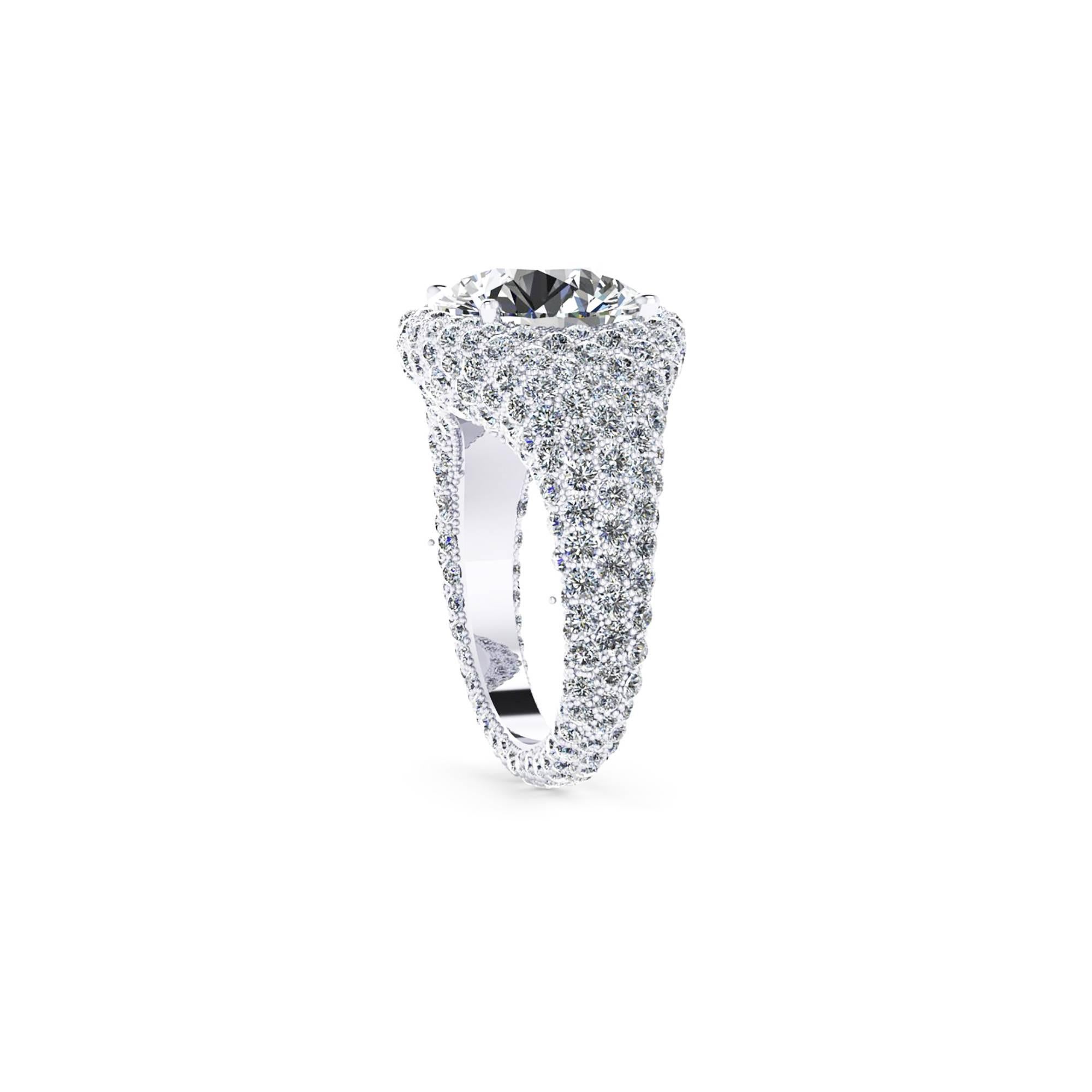 Ferrucci GIA Certfied 5.02 Carats, Round Cut, E Color VVS2 Clarity. 
Concieved by Ferrucci in New York City, hand crafted in his exclusive private Athelier in Manhattan, where the magic of jewelery happens. This gorgeous diamond ring is completely