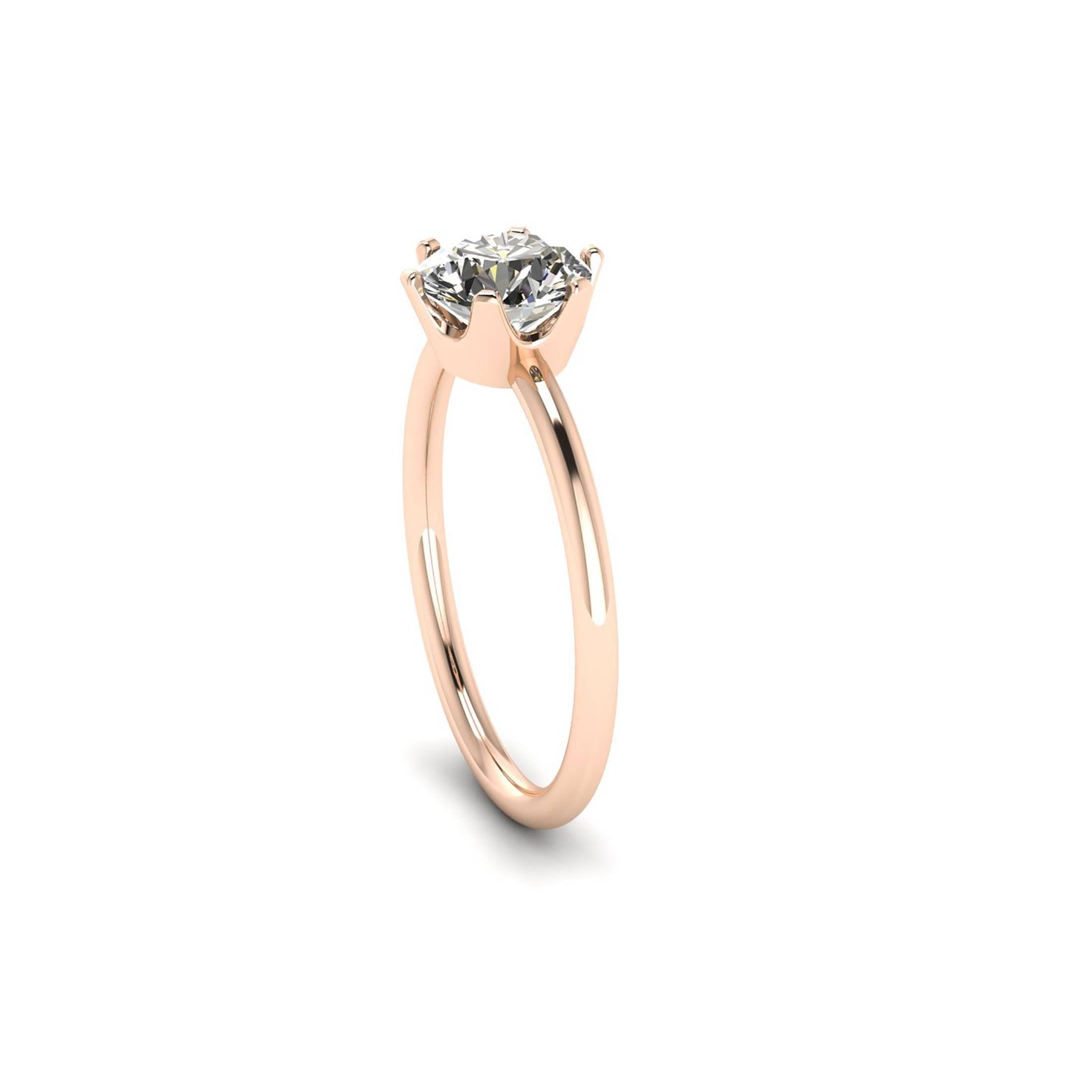 GIA Certified 1.01 Carat white diamond, J color, SI2 clarity, hand set in in hand made 18k rose gold solitaire ring, conceived in New York City, with the best Italian manufacturing.

The original GIA Certificate will accompany the ring.

Ring size 5