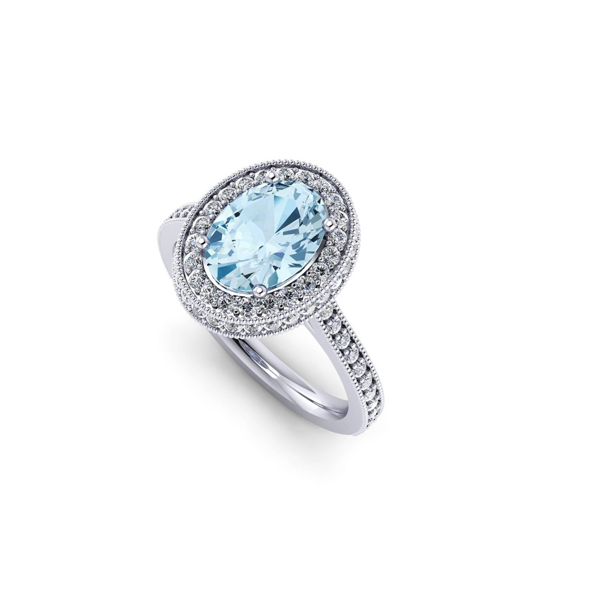 Ferrucci 1.40 carat natural oval Aquamarine adorned by a double halo of round bright diamonds for a total carat weight of 0.51 carats, conceived in a hand made 18k white gold ring.

Handcrafted with the best Italian manufacturing quality, a classic