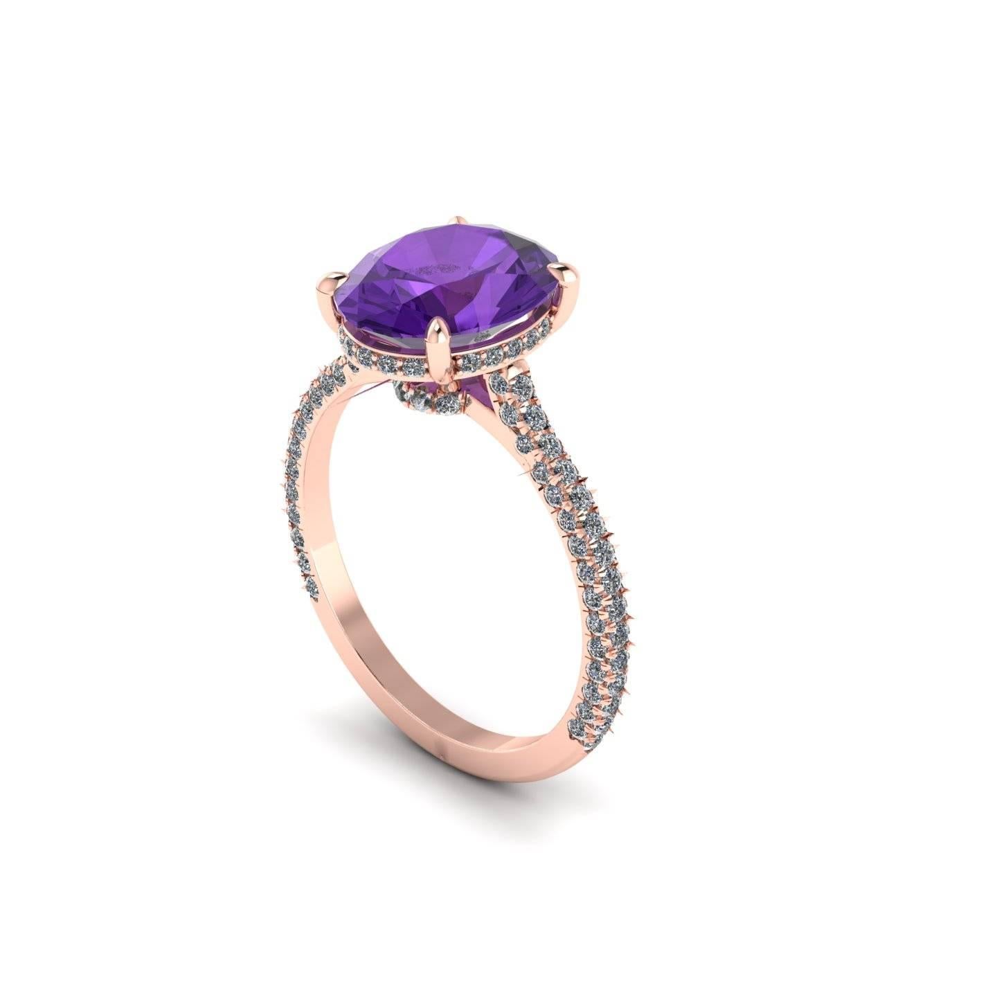 Natural Purple Oval Amethyst, hand cut in Oval cut shape, clean and pure gem, conveiced in an hand made 18k Rose gold cocktail ring,
adorned with a shower of ultra white diamonds, hand set, on almost every surface of the ring, to give the maximum