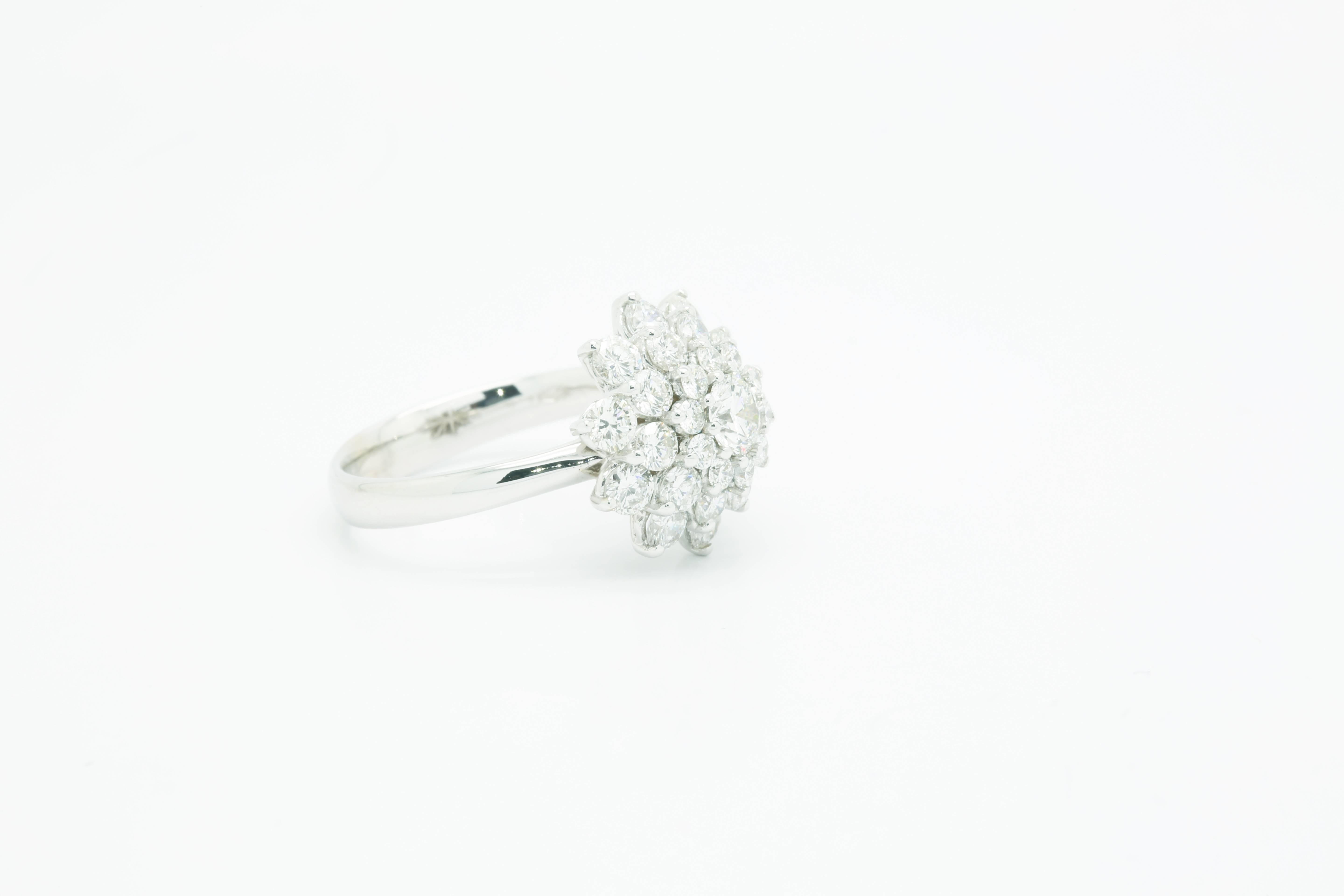 FERRUCCI 2.13 carat white diamonds Flower Cluster in an hand made 18k white gold ring
This ring is a size 7, complimentary sizing upon order before shipping.

