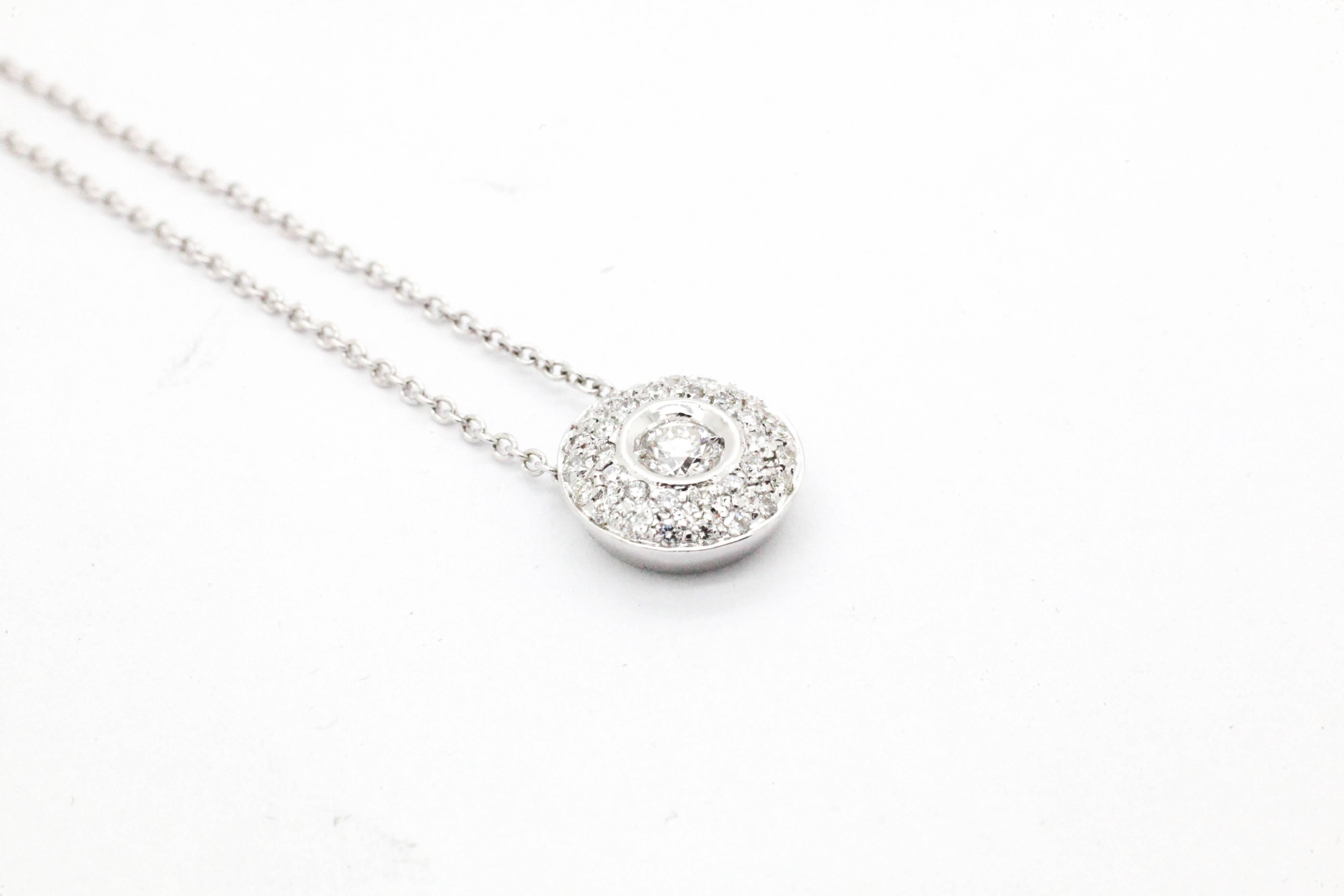 FERRUCCI Round diamonds Pendant in 18k white gold adorned by diamond pave set, for an elegant and fine touch of class, carat weight of 0.42 ct. On a 16