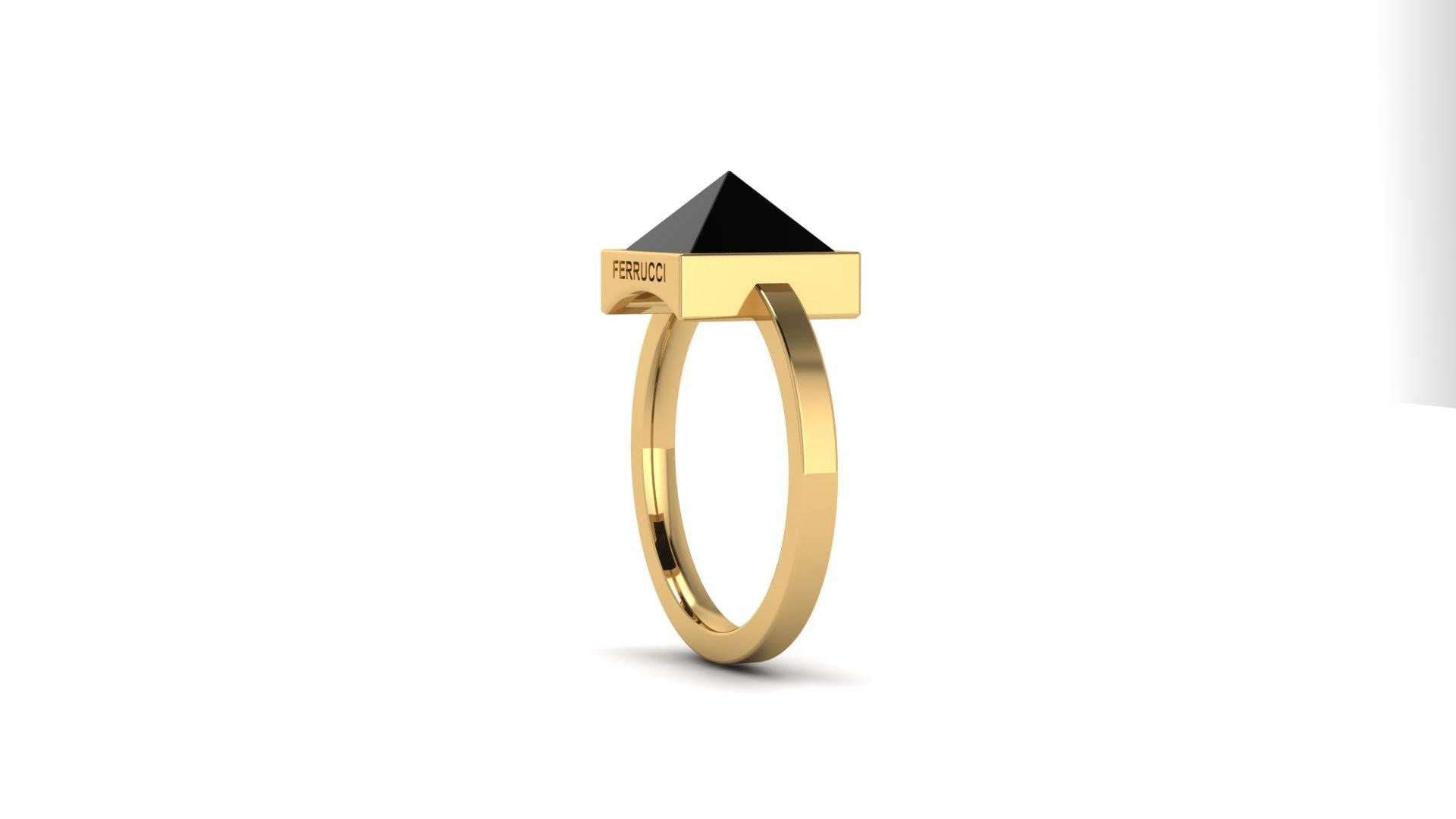 FERRUCCI Pyramid, a Black Onyx ring in 18k yellow gold, made in New York.

Onyx is believed to offer personal protection and relationship harmony and The Pyramid symbolizes bigger consciousness of strength and energy.

Ring size 6 adjustable upon