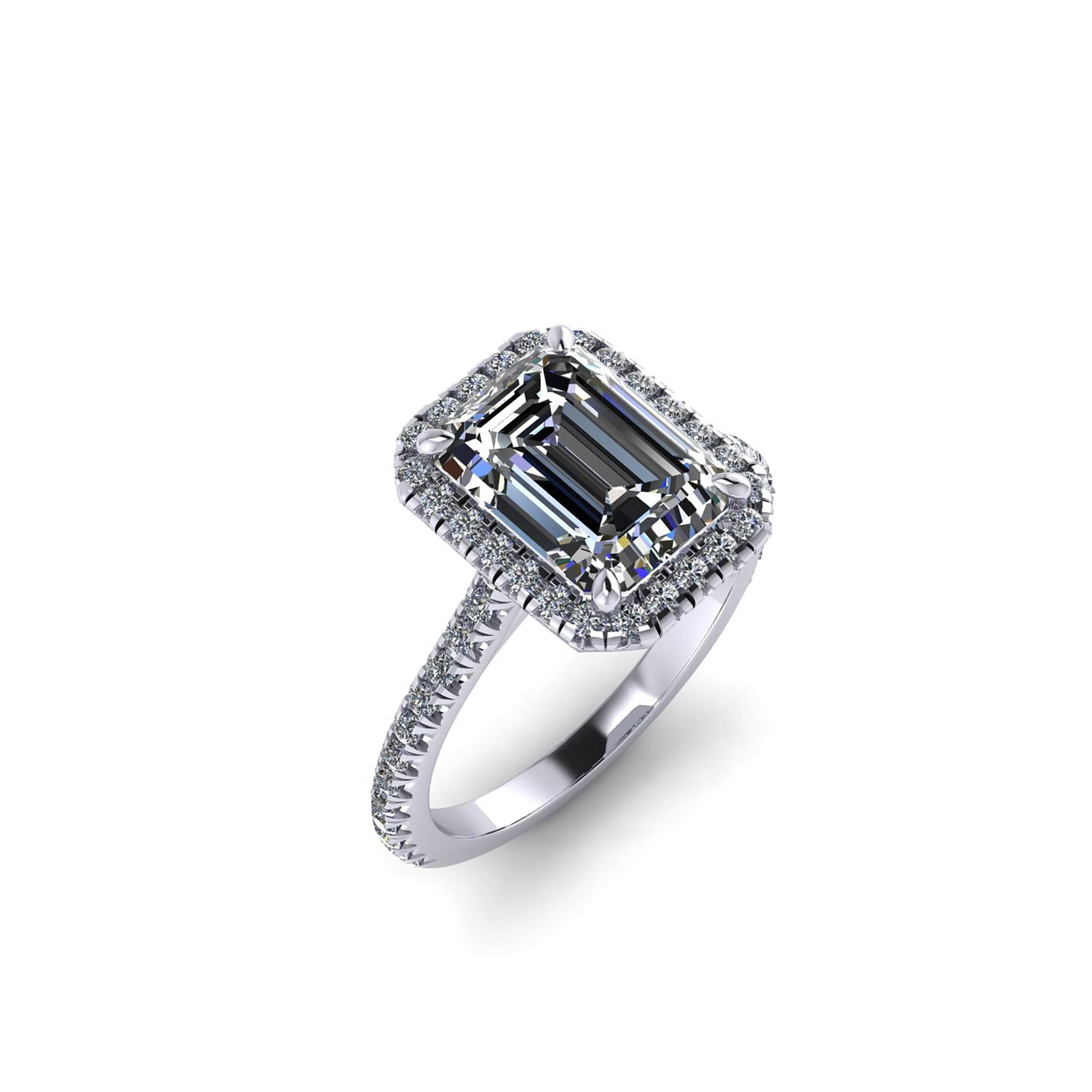 Ferrucci GIA Certified 3.00 carat Emerald cut wonderful diamond, F color, VS2 clarity,  in a hand made Platinum ring, with a halo of white diamonds and diamond of the shank, hand set cut-down style for enhancing to the maximum the reflection of the