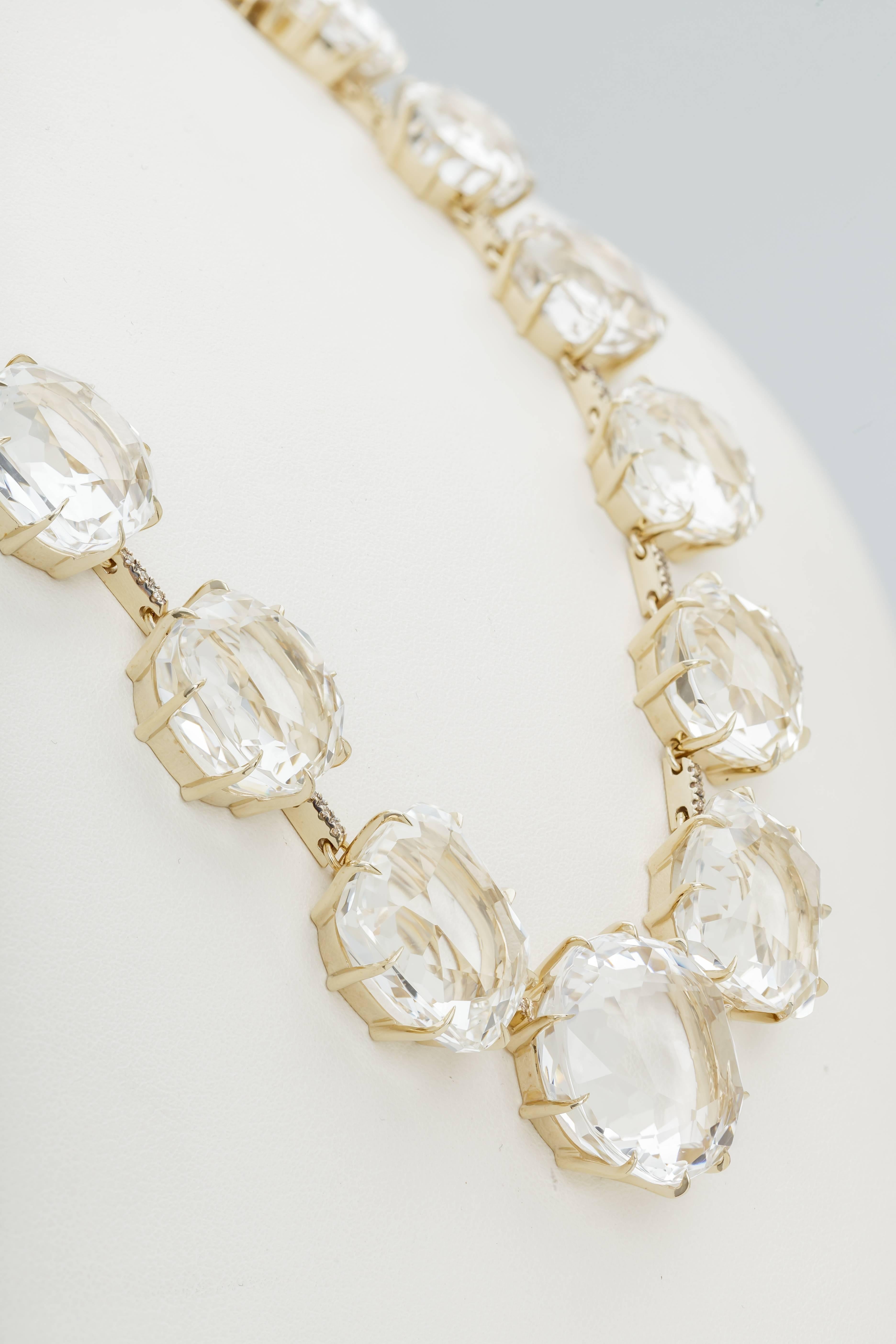 This new H. Stern Moonlight necklace features luminous colorless quartz set in 18k noble gold.  Noble gold, H. Stern's exclusive gold alloy, is between yellow and white gold.  The total quartz weight is 221.49ct.  There are cognac diamonds set