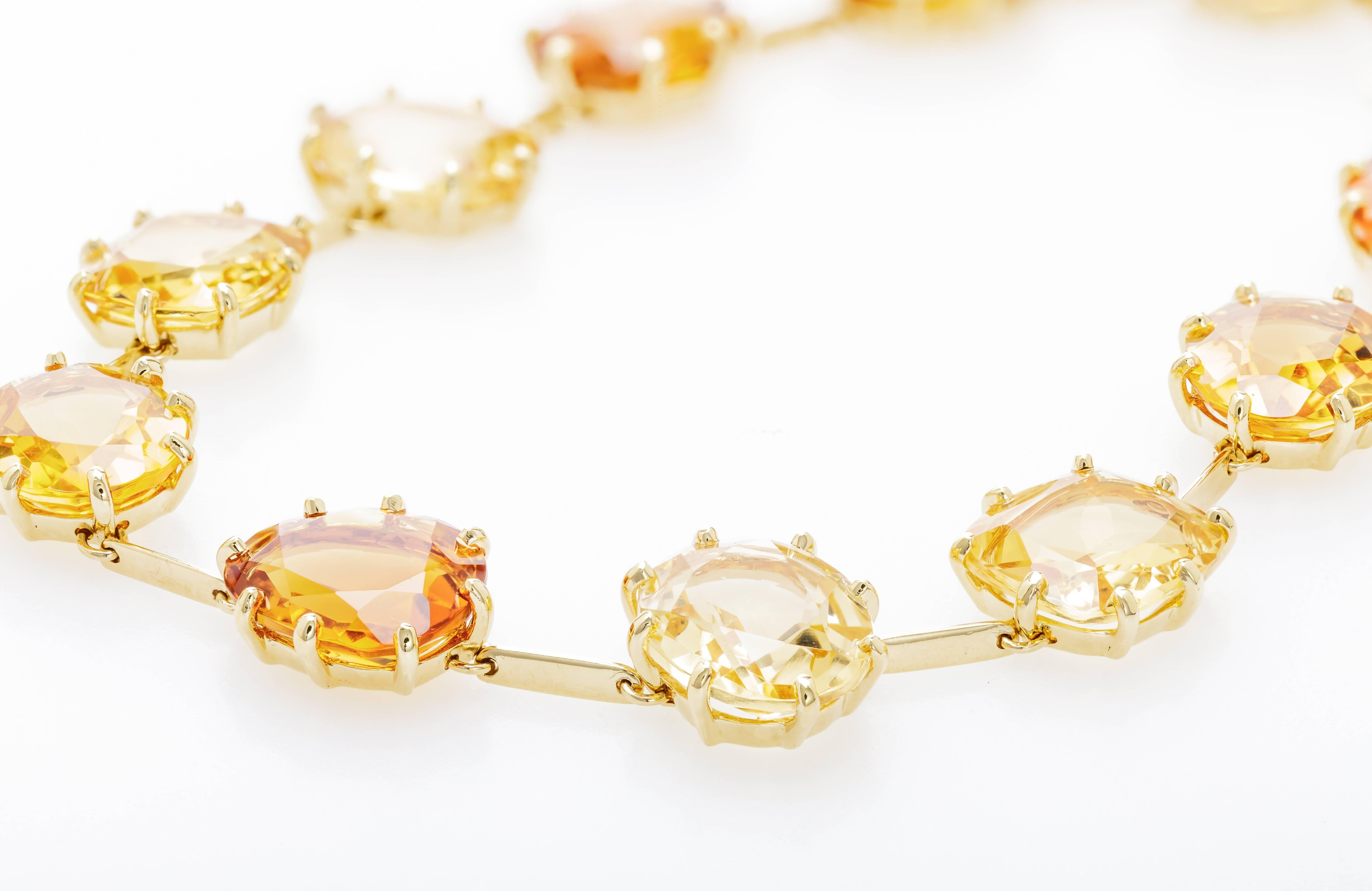 This new H. Stern Sunrise bracelet features 12 citrine totaling 29.27ct in various shades set in 18k yellow gold.  There is one 0.06ct sapphire and one 0.08ct diamond.  The bracelet measures 7.5