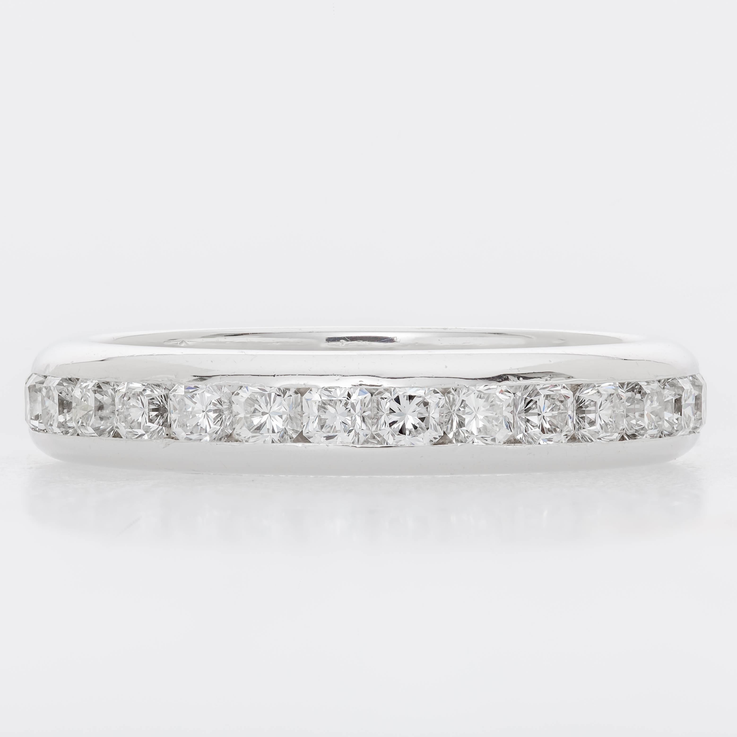 This Tiffany & Co. Lucida eternity band is a size 6.5 and features 2.00 ct. of diamonds set in platinum.  Tiffany's Lucida cut is a patented mixed cut.  The band measures 21mm wide and 3.5mm thick.