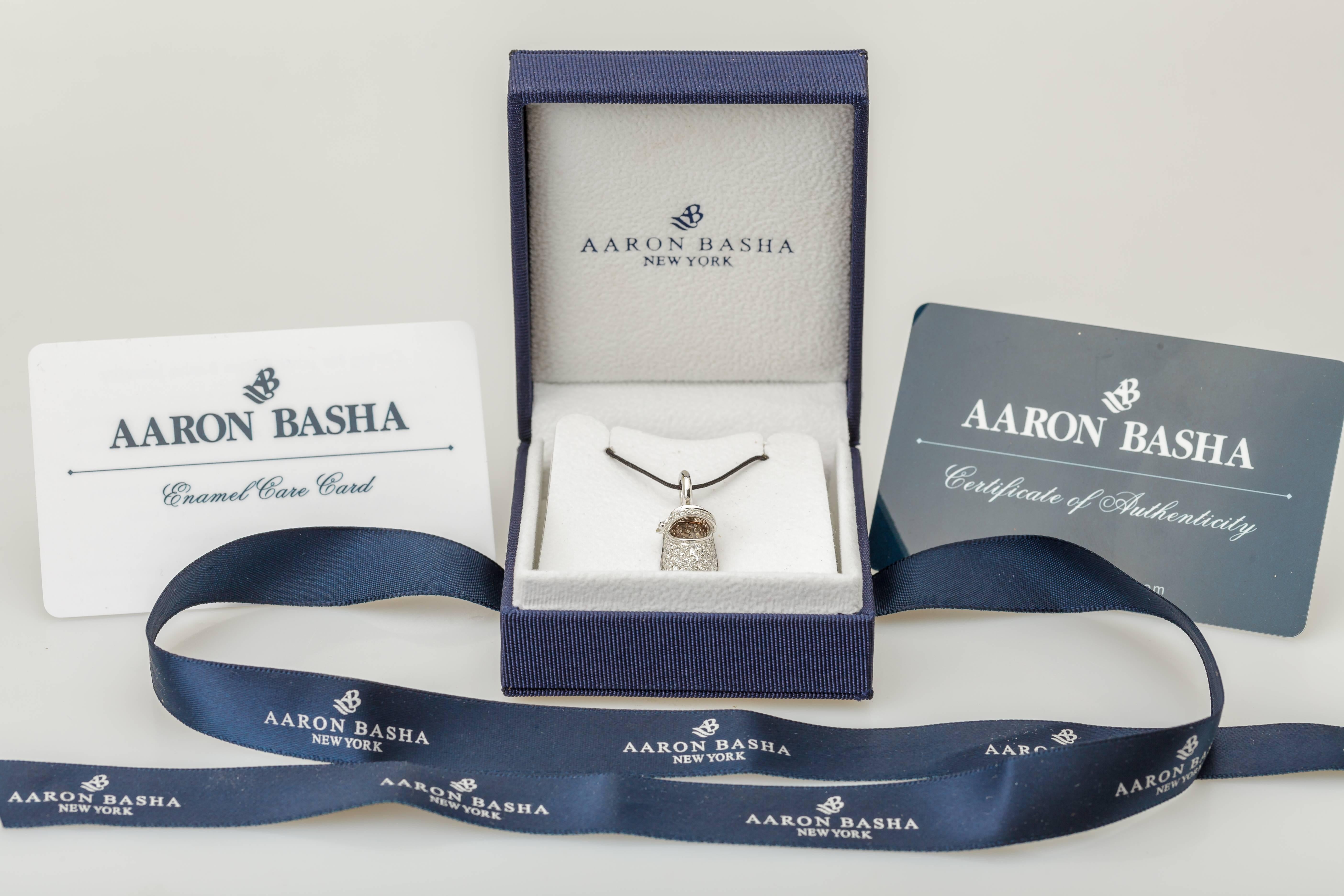 This 18k white gold Aaron Basha buckle shoe dangle charm features pavé set diamonds totaling 0.65ct.