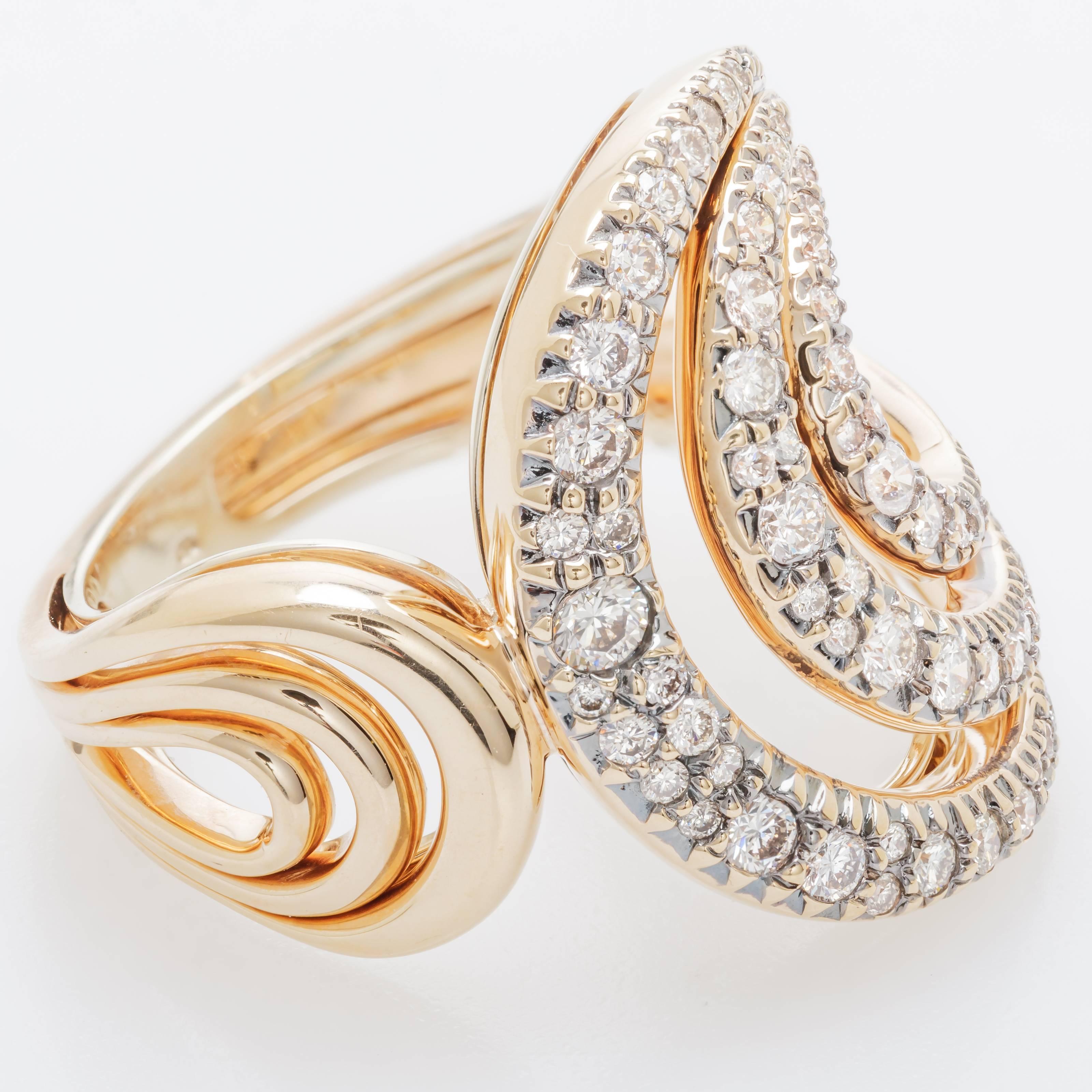 This new H. Stern Iris ring features 64 brown diamonds totaling 0.76ct set in 18K rose and noble gold.  Noble gold, H. Stern's signature alloy, has the warmth of yellow gold and the elegance of white gold.  It measures 1 inch tall, 1 15/16 inches